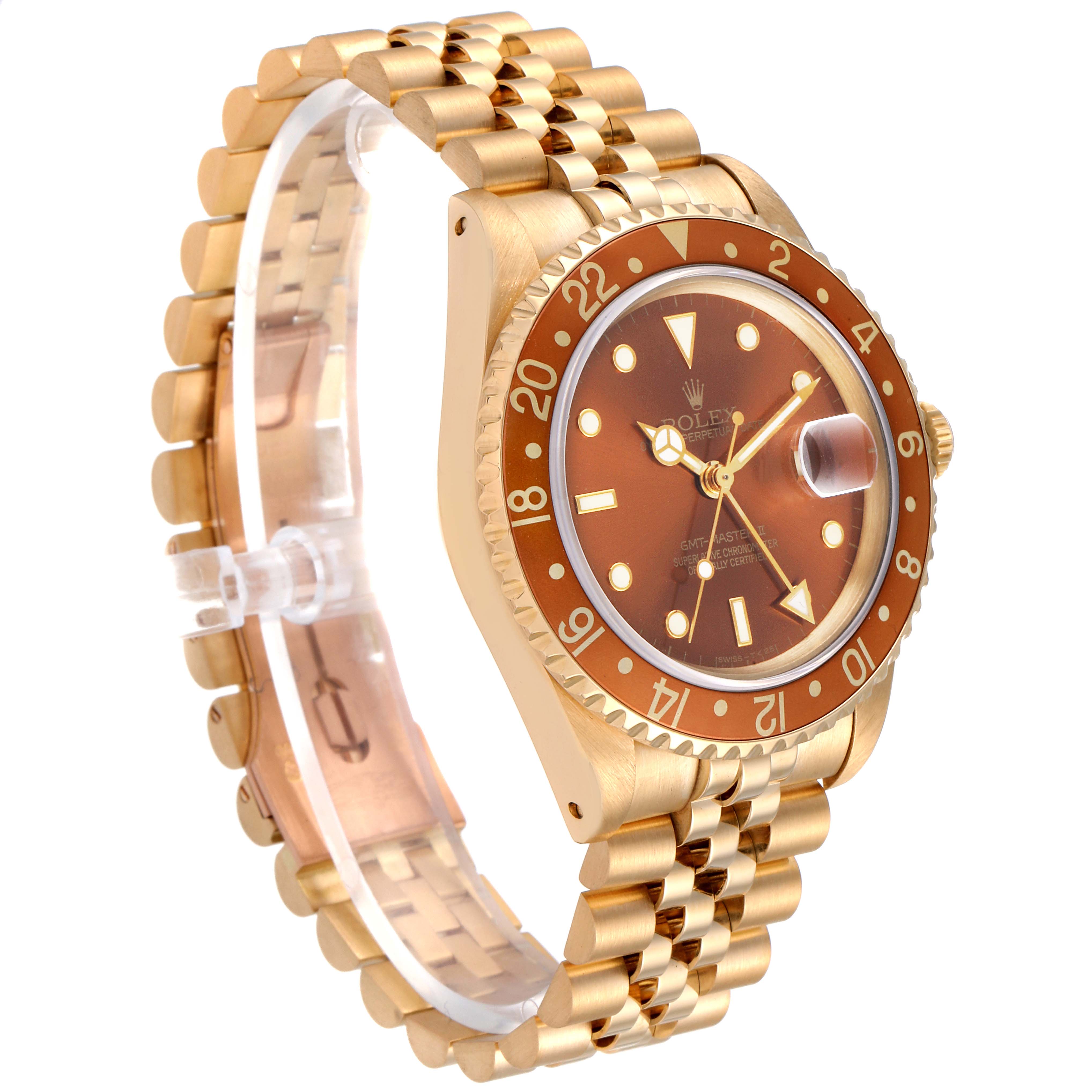 This image shows a Rolex GMT-Master 16718 Men's Yellow Gold Brown Dial 16718 Men's Yellow Gold Brown Dial watch at a slight angled view, illustrating the gold bracelet, case, and bezel.