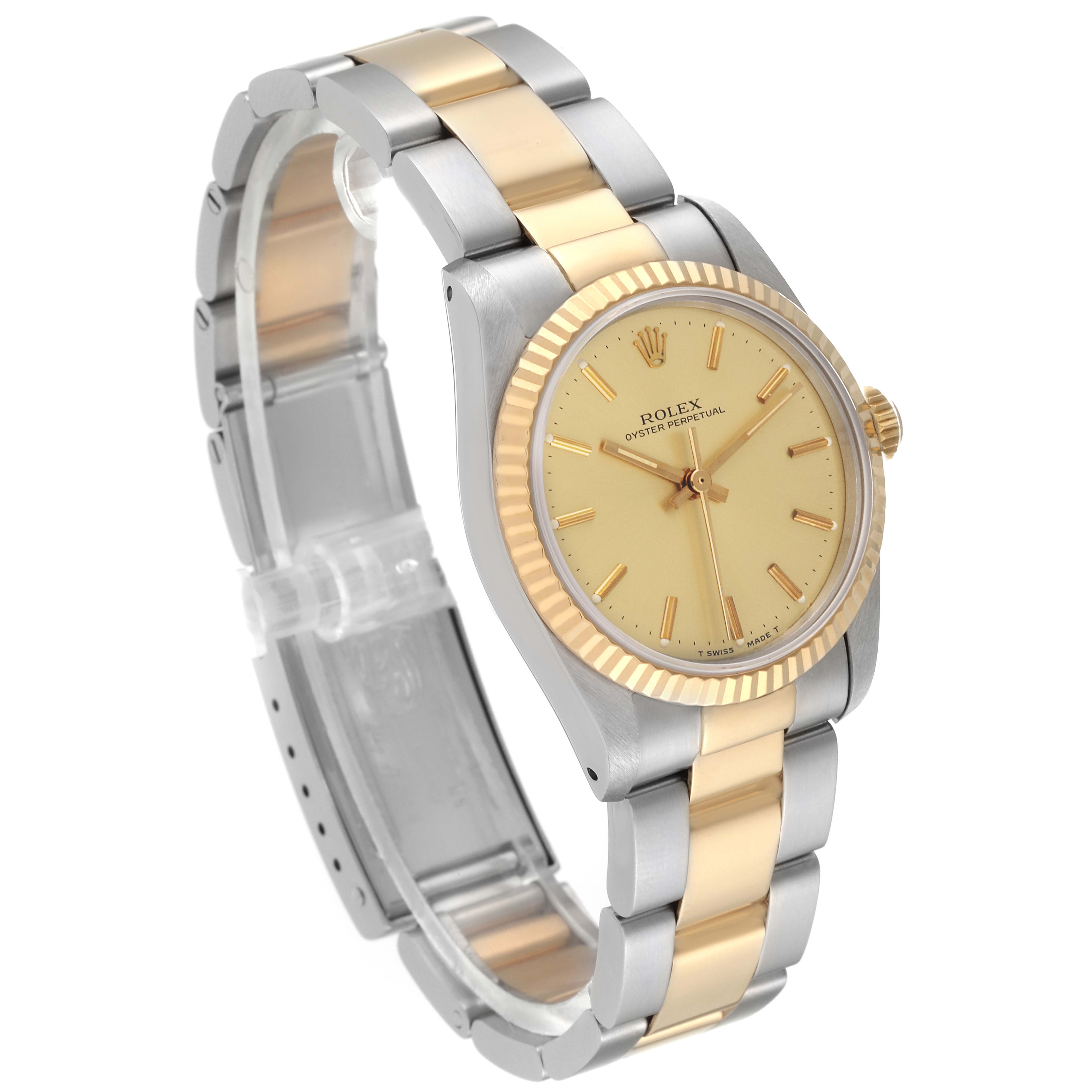The image shows a Rolex Mid-Size 67513 Women's Steel and Gold (two tone) Champagne Dial 67513 Women's Steel and Gold (two tone) Champagne Dial watch from a three-quarter angle, highlighting its two-tone bracelet and bezel.