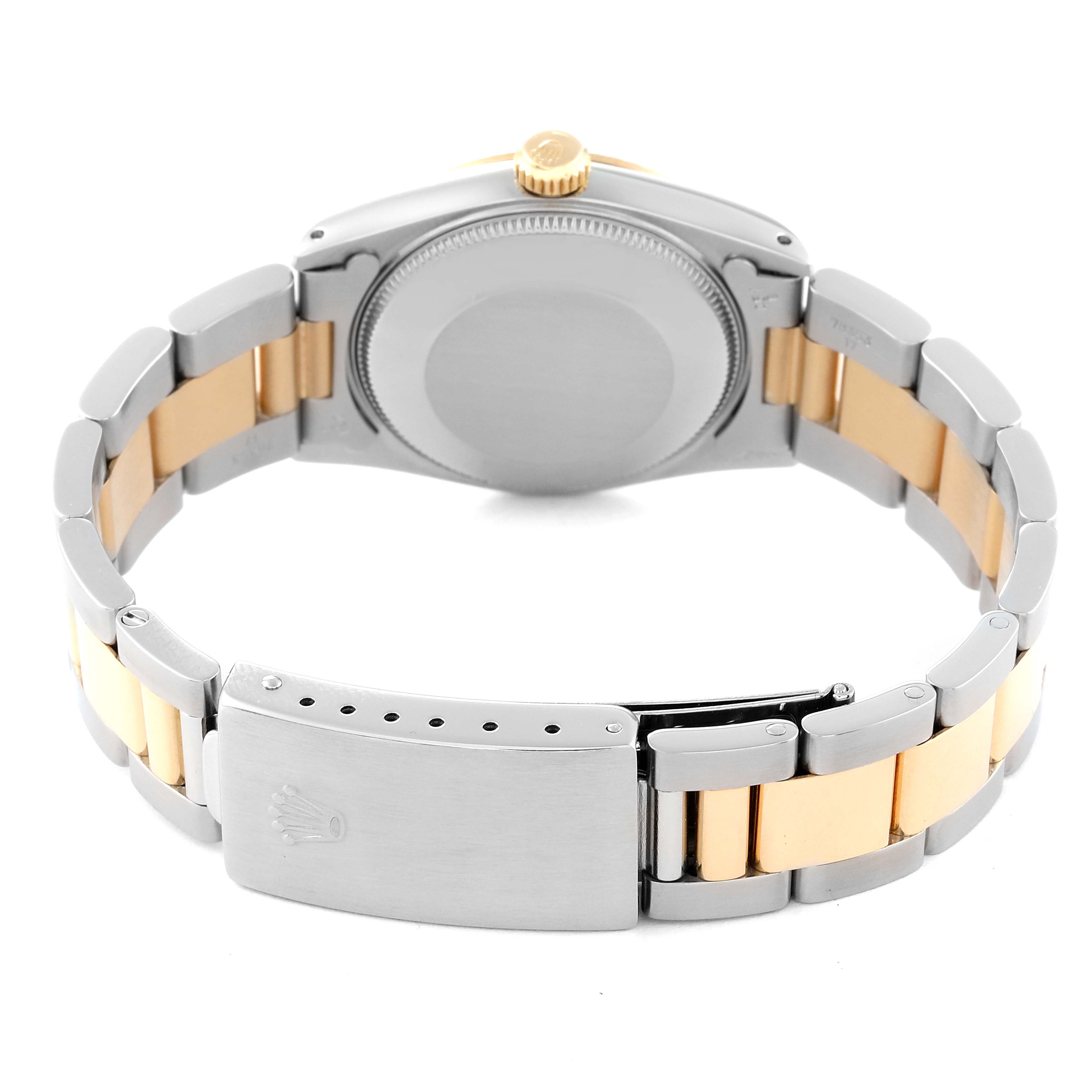 This image shows the back view of a Rolex Mid-Size 67513 Women's Steel and Gold (two tone) Champagne Dial 67513 Women's Steel and Gold (two tone) Champagne Dial model watch with a two-tone bracelet and closed clasp.