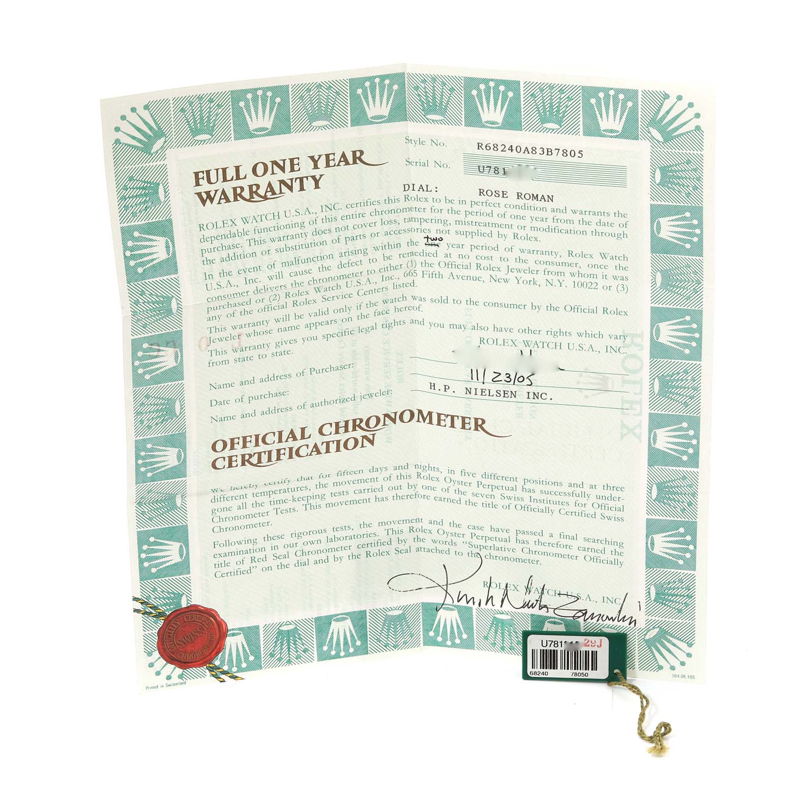 This image shows the official chronometer certification and warranty paperwork for a mid-size Rolex watch.