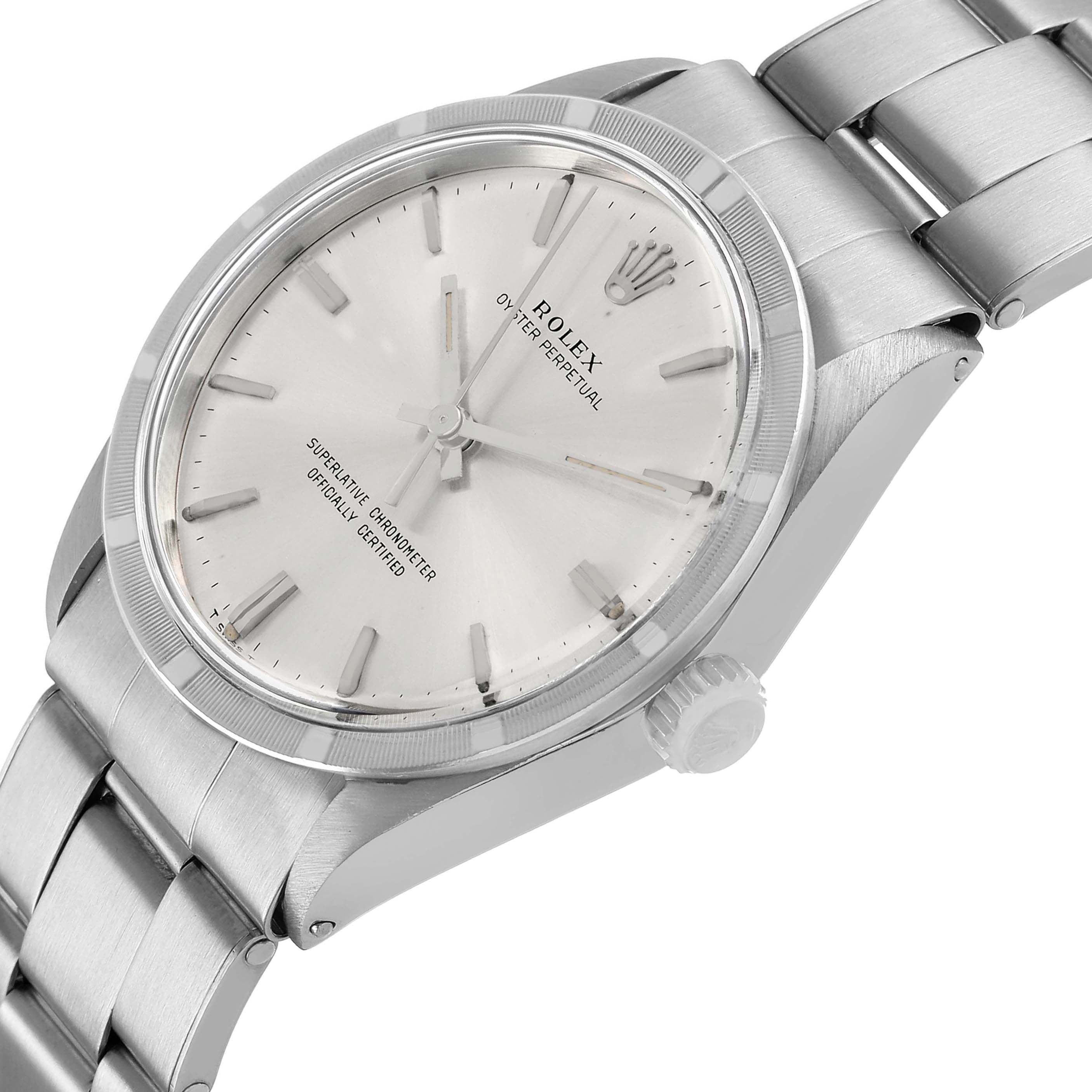 The Rolex Vintage collects 
ion 1007 Men's Stainless Steel Silver Dial watch is shown at an angled view displaying the face, crown, and a portion of the metal bracelet.