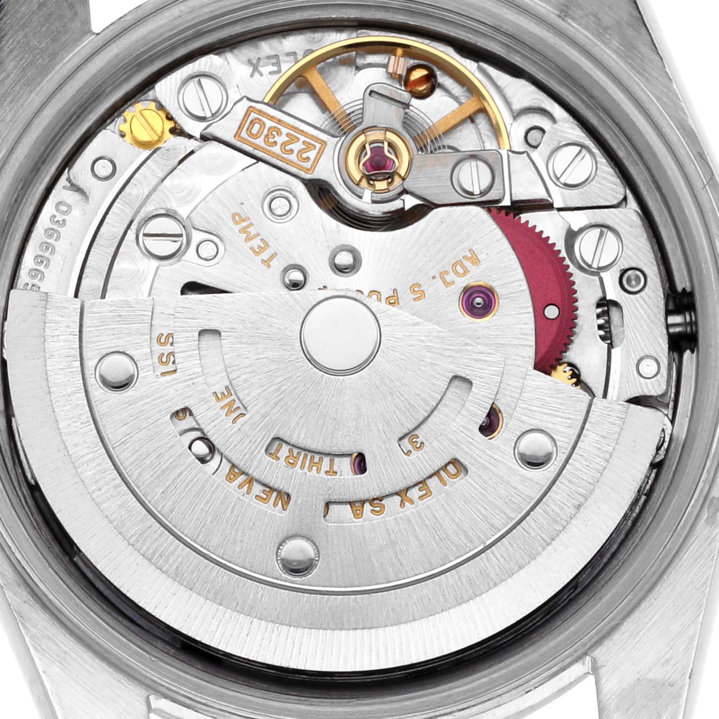 The image shows the movement of a Rolex Oyster Perpetual 76080 Women's Stainless Steel White Dial 76080 Women's Stainless Steel White Dial, focusing on the rotor and mechanical components from the back.