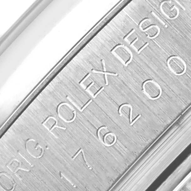 The image shows a close-up of the watch's engraving on the side of the case, featuring the Rolex Oyster Perpetual 176200 Women's Stainless Steel Pink Dial 176200 Women's Stainless Steel Pink Dial branding.
