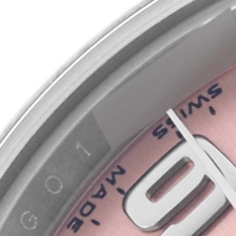 The image shows a close-up of the dial and edge of the bezel of a Rolex Oyster Perpetual 176200 Women's Stainless Steel Pink Dial 176200 Women's Stainless Steel Pink Dial watch, displaying part of the numeral.