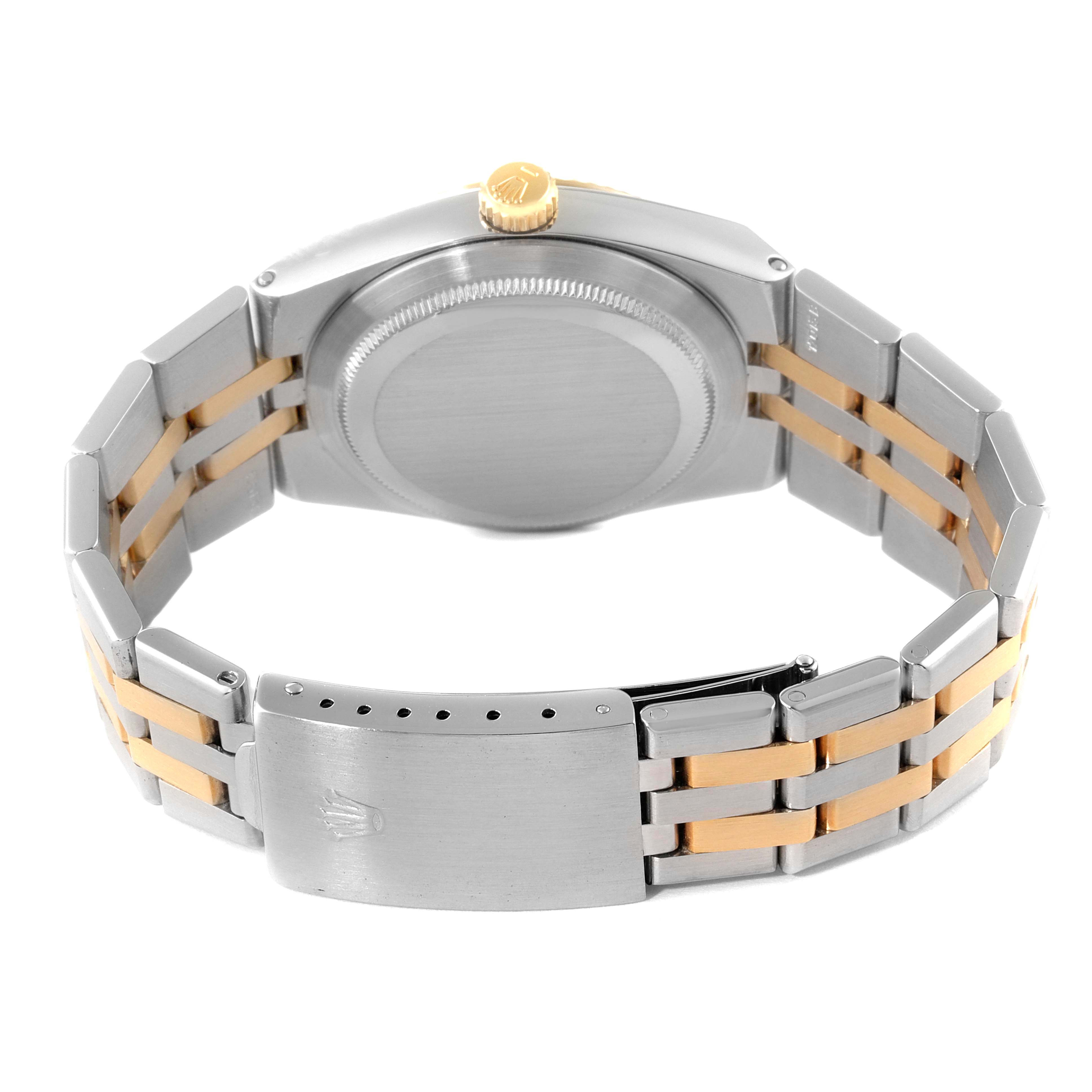 The image shows the back and bracelet of a Rolex Oysterquartz 17013 Men's Steel and Gold (two tone) Champagne Dial 17013 Men's Steel and Gold (two tone) Champagne Dial watch, highlighting its clasp, case back, and crown.