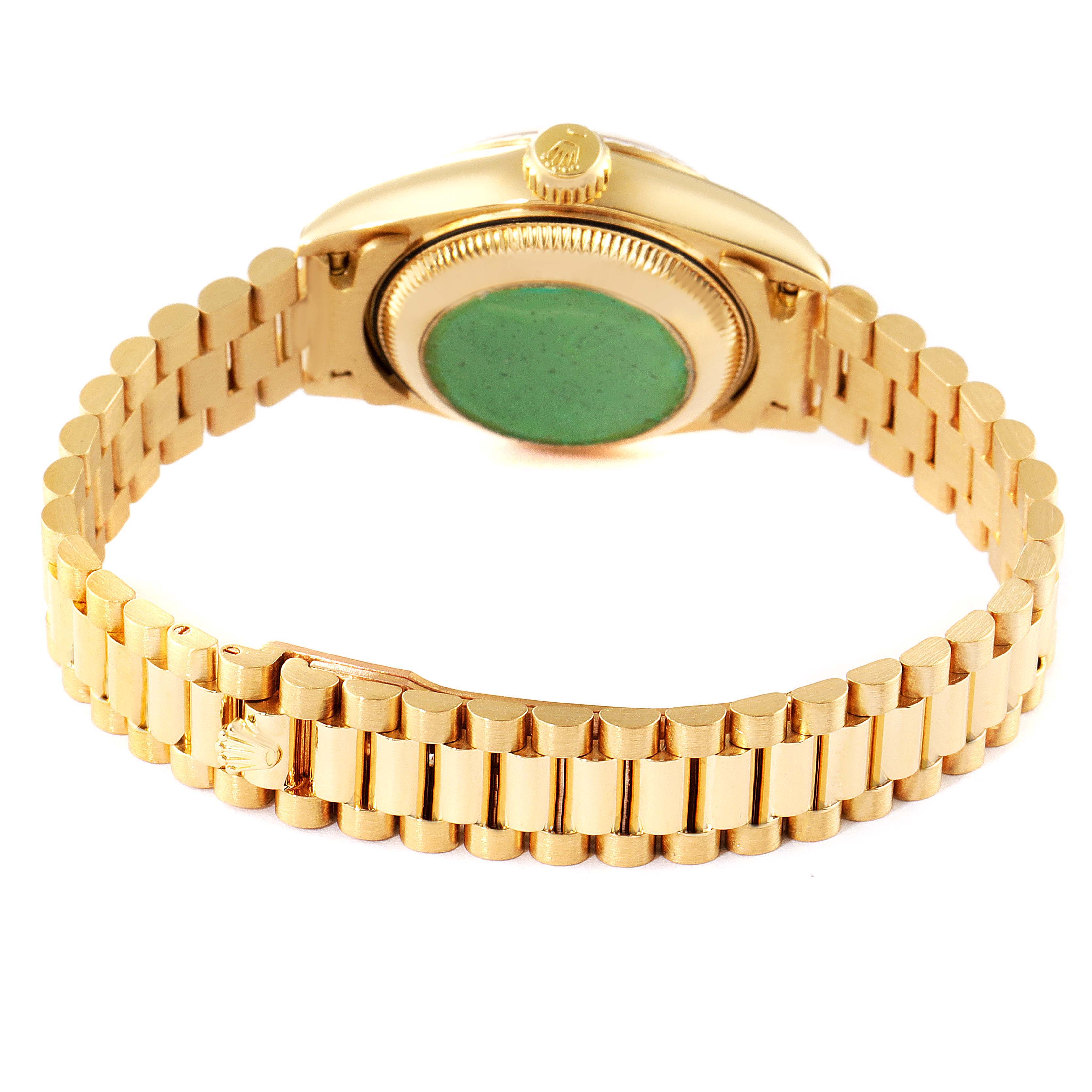This image shows the back and bracelet of a Rolex President 69178 Women
s Yellow Gold Champagne Dial 69178 Women
s Yellow Gold Champagne Dial model watch, focusing on the clasp and crown.