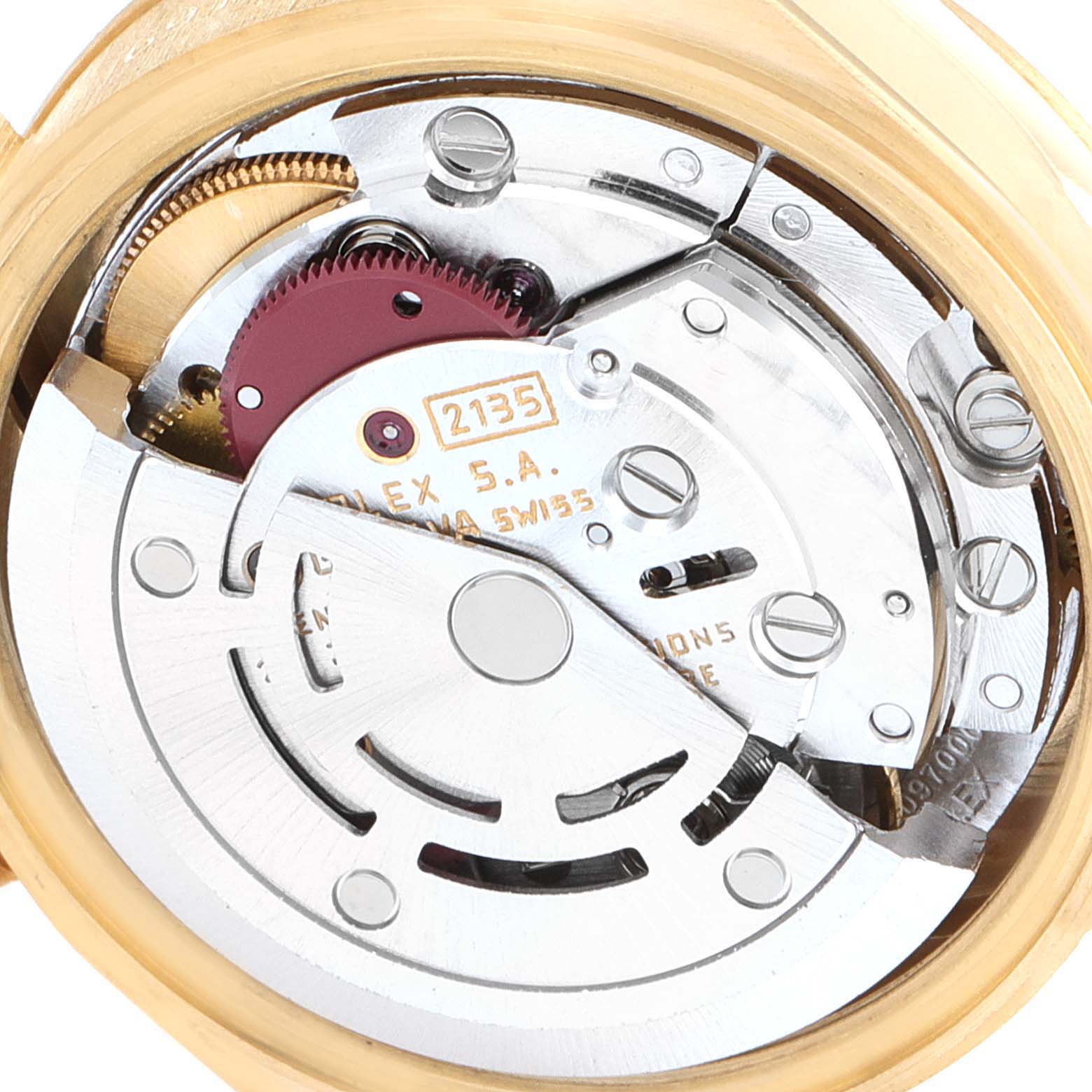 This image shows the movement mechanism of a Rolex President 69178 Women
s Yellow Gold Champagne Dial 69178 Women
s Yellow Gold Champagne Dial model watch with various gears and components visible.