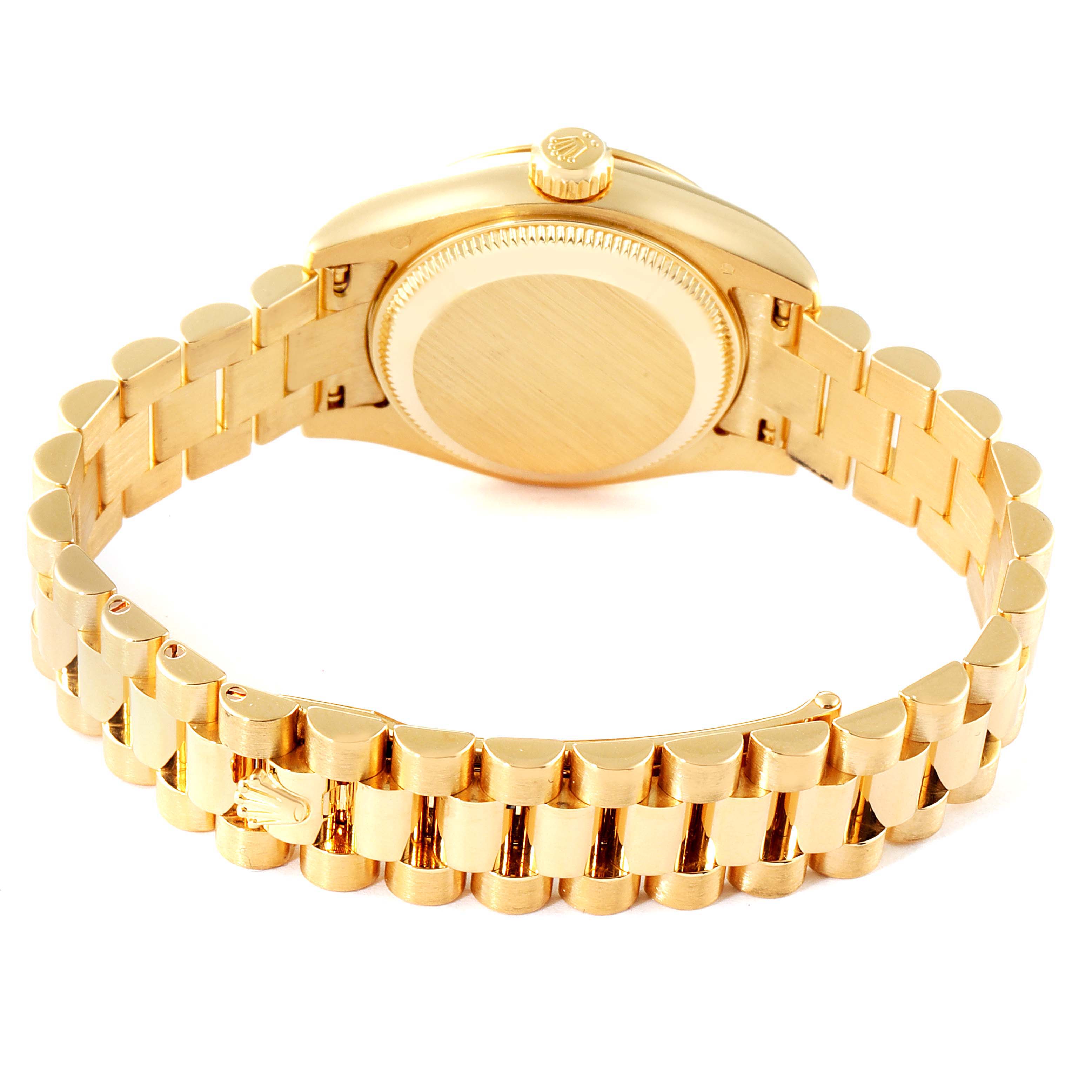 The image shows the back and bracelet of a Rolex President 179178 Women
s Yellow Gold White Dial 179178 Women
s Yellow Gold White Dial model watch at an angled view.