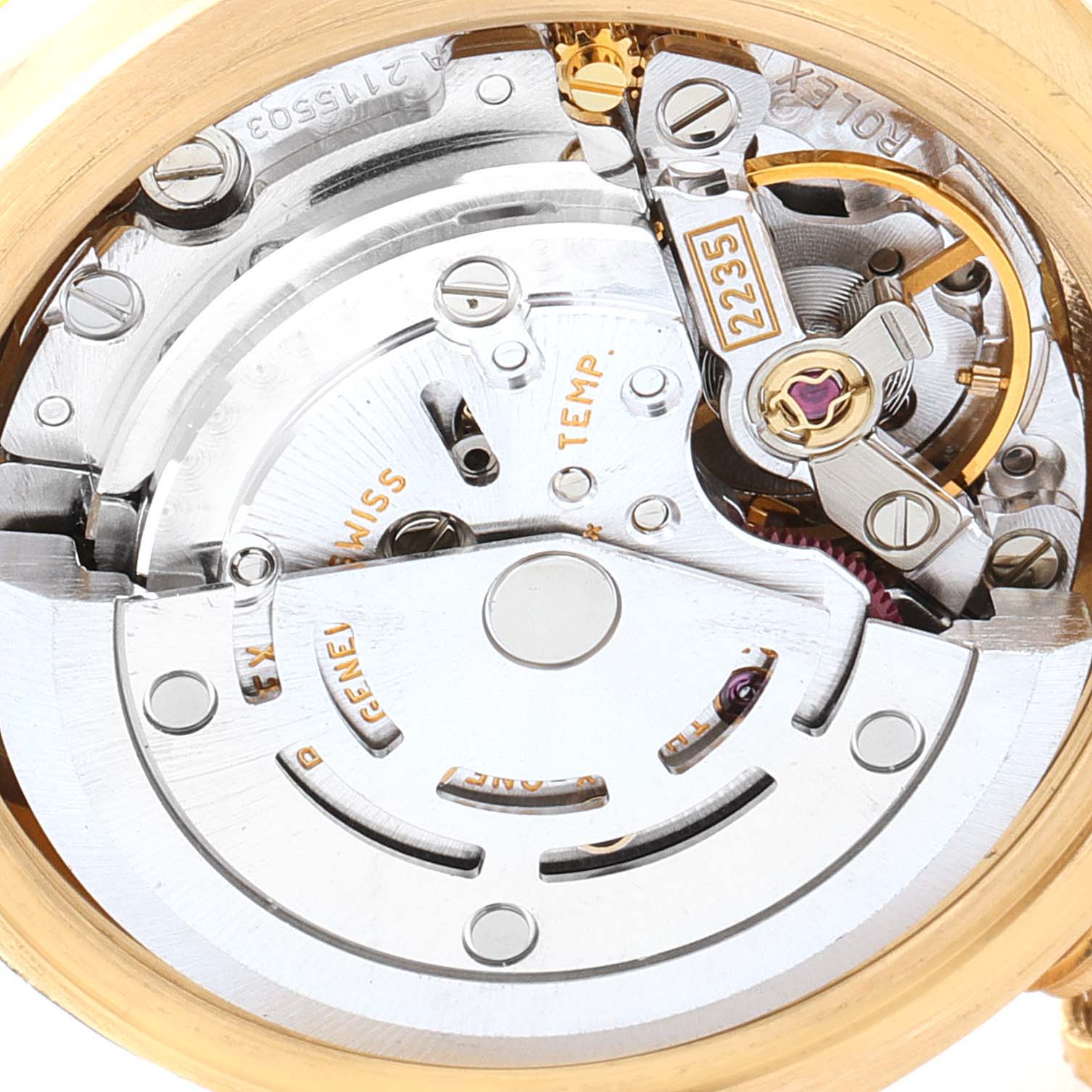 This image shows a close-up of the movement mechanism of a Rolex President 179178 Women
s Yellow Gold White Dial 179178 Women
s Yellow Gold White Dial model watch.