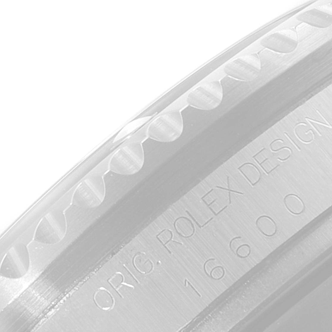 This image shows a close-up angle of the bezel and engraved side of a Rolex Sea-Dweller 16600 Men
s Stainless Steel Black Dial 16600 Men
s Stainless Steel Black Dial model.