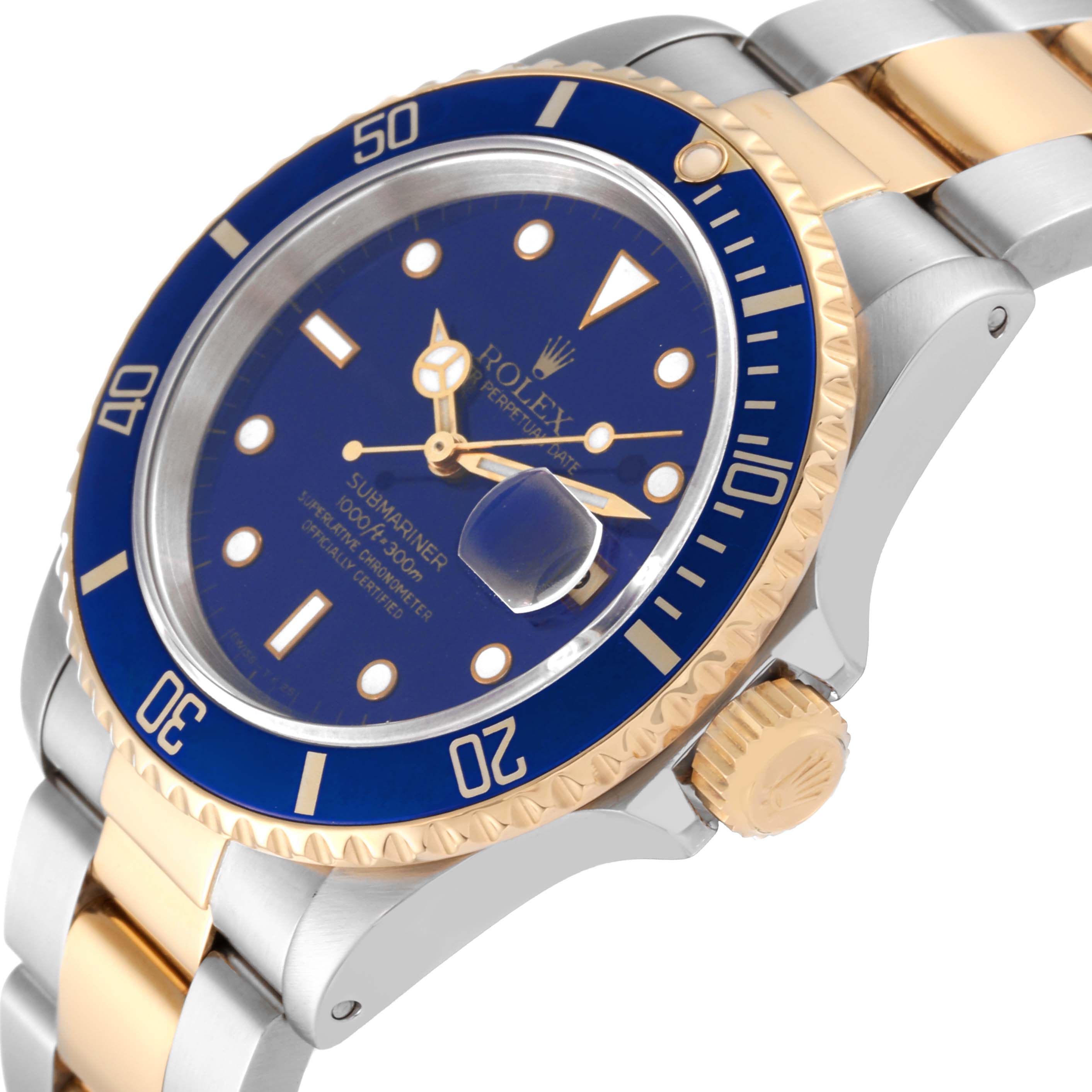 This image shows a close-up angle of the Rolex Submariner 16613 Men
s Steel and Gold (two tone) Blue Dial 16613 Men
s Steel and Gold (two tone) Blue Dial, highlighting its blue dial, two-tone bezel, and part of the bracelet.