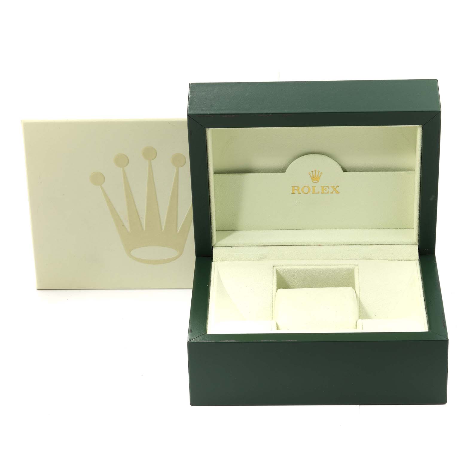 The image shows an open green and cream Rolex box for the Submariner model, with a cushioned slot for the watch.