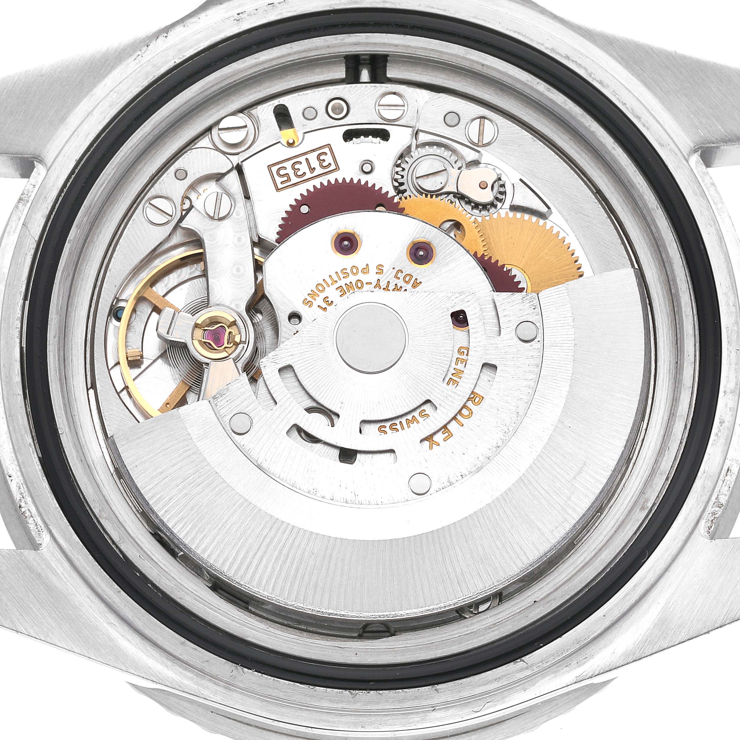 This image shows the intricate inner mechanical movement of a Rolex Submariner 16610 Men
s Stainless Steel Black Dial 16610 Men
s Stainless Steel Black Dial watch from a top-down angle.