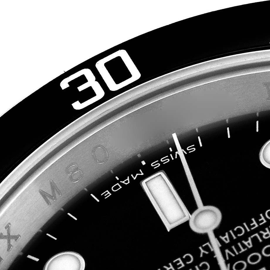 This close-up image shows the bezel and part of the dial of a Rolex Submariner 16610 Men
s Stainless Steel Black Dial 16610 Men
s Stainless Steel Black Dial watch, highlighting the "30" minute marker.