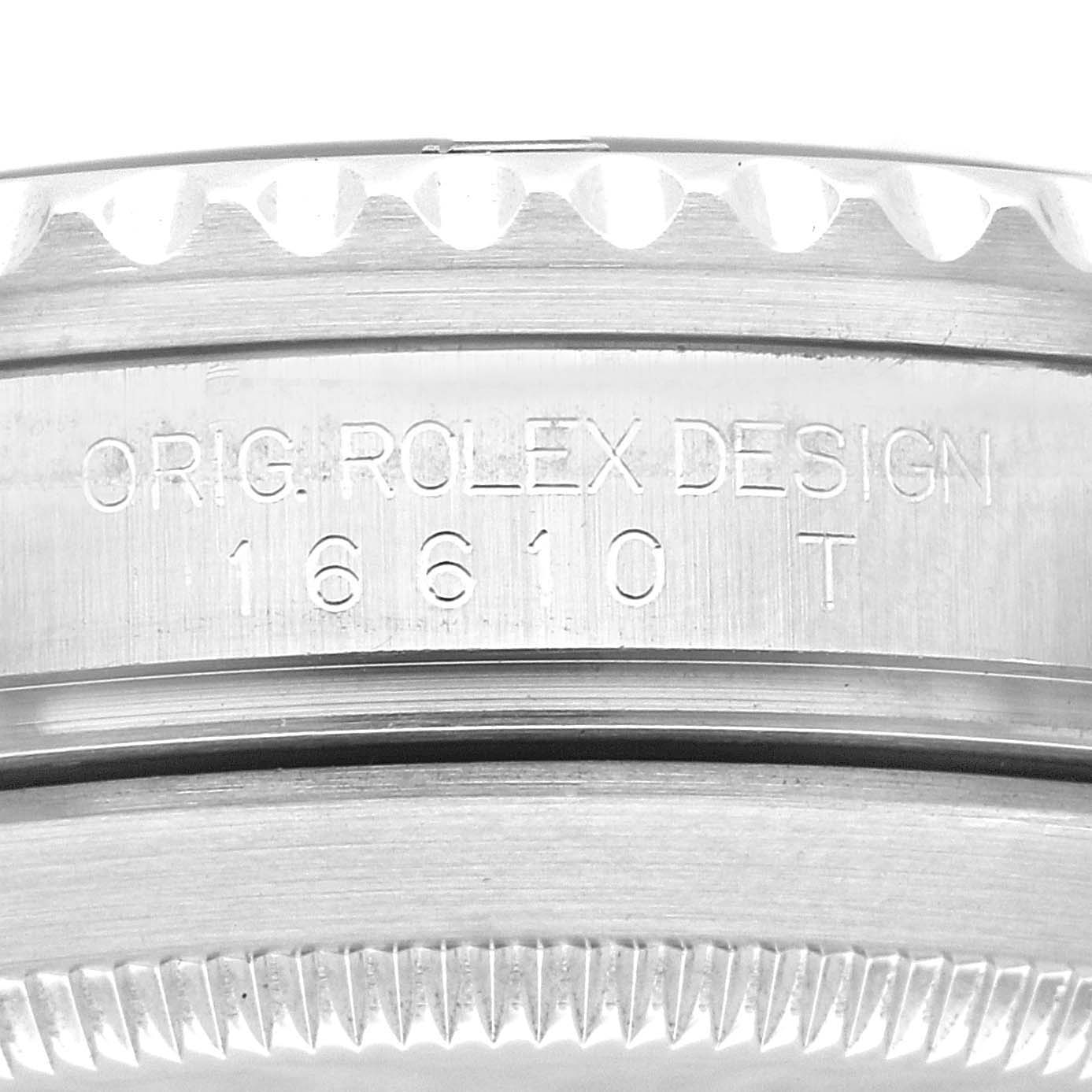 This image shows a close-up of the engraved inner bezel of a Rolex Submariner 16610 Men
s Stainless Steel Black Dial 16610 Men
s Stainless Steel Black Dial watch, displaying the model number "16610."