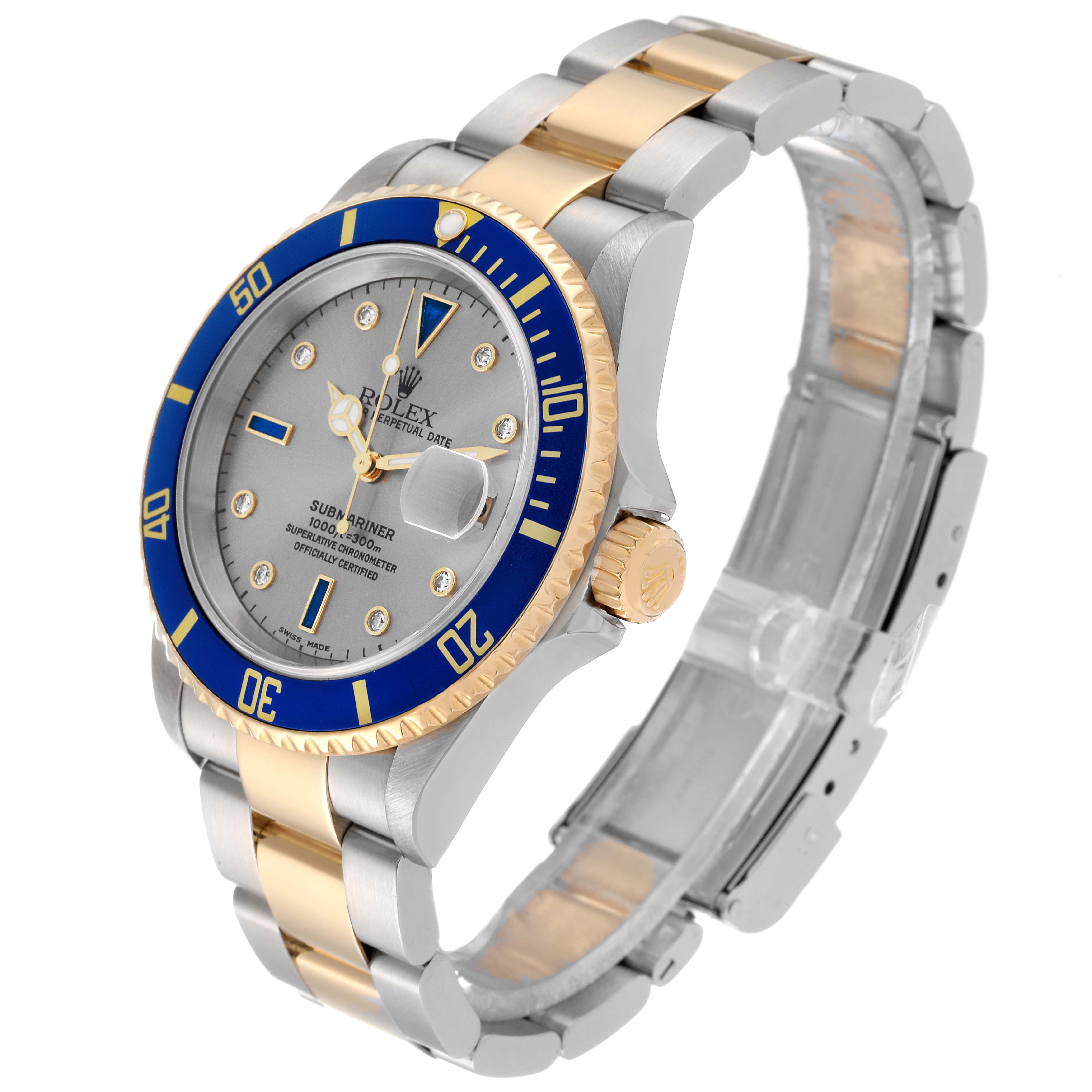 The Rolex Submariner 16613 Men
s Steel and Gold (two tone) Grey Dial 16613 Men
s Steel and Gold (two tone) Grey Dial watch is shown at an oblique angle, displaying the face, bezel, crown, and two-tone metal bracelet.