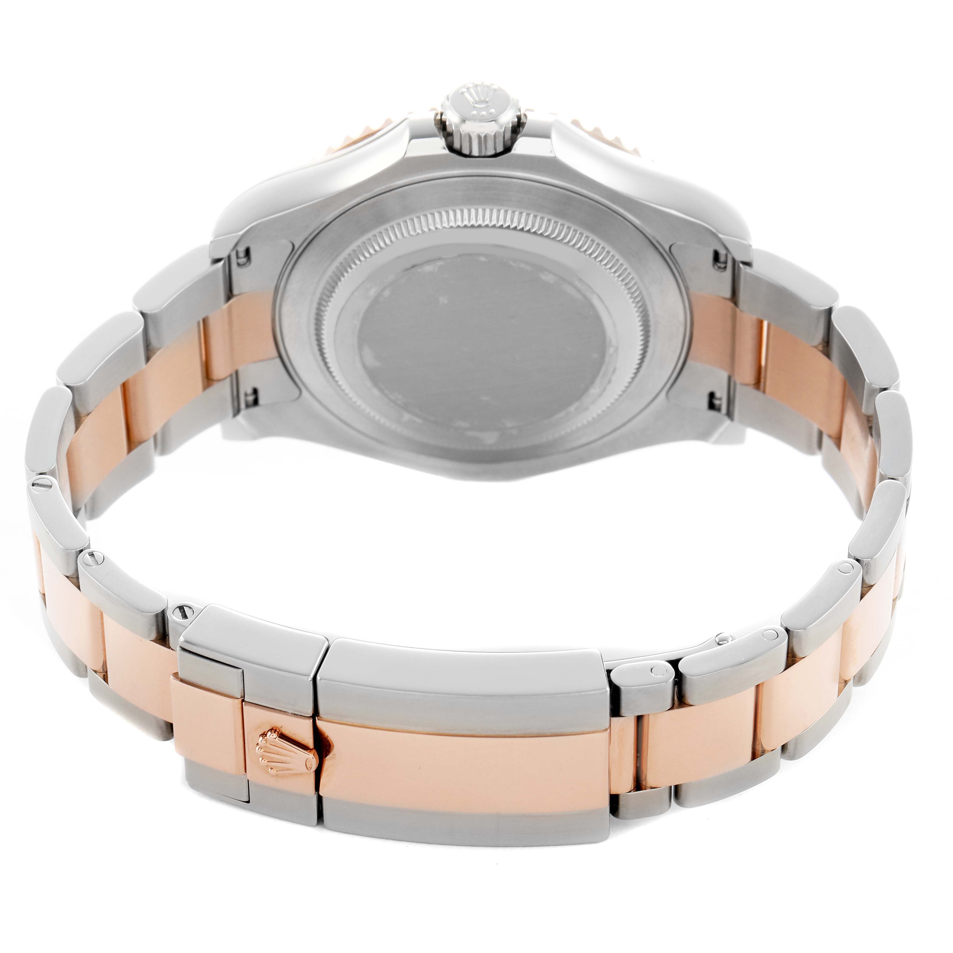 The image shows the back of a Rolex Yacht-Master 126621 Men's Steel and Gold (two tone) Black Dial watch, highlighting the caseback and two-tone bracelet with a clasp.