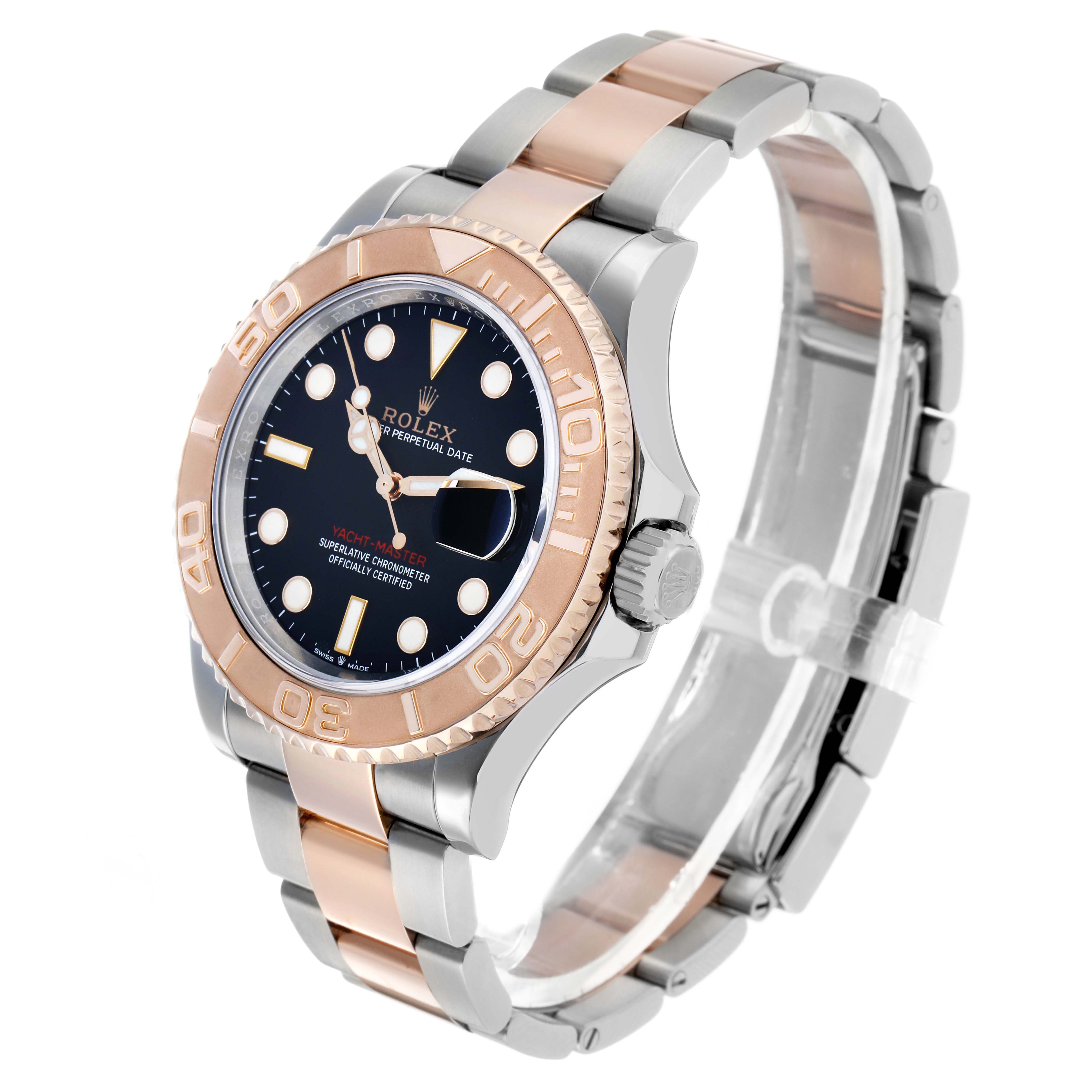 The Rolex Yacht-Master 126621 Men's Steel and Gold (two tone) Black Dial watch is shown at an angled side view, highlighting the bezel, dial, and two-tone bracelet.
