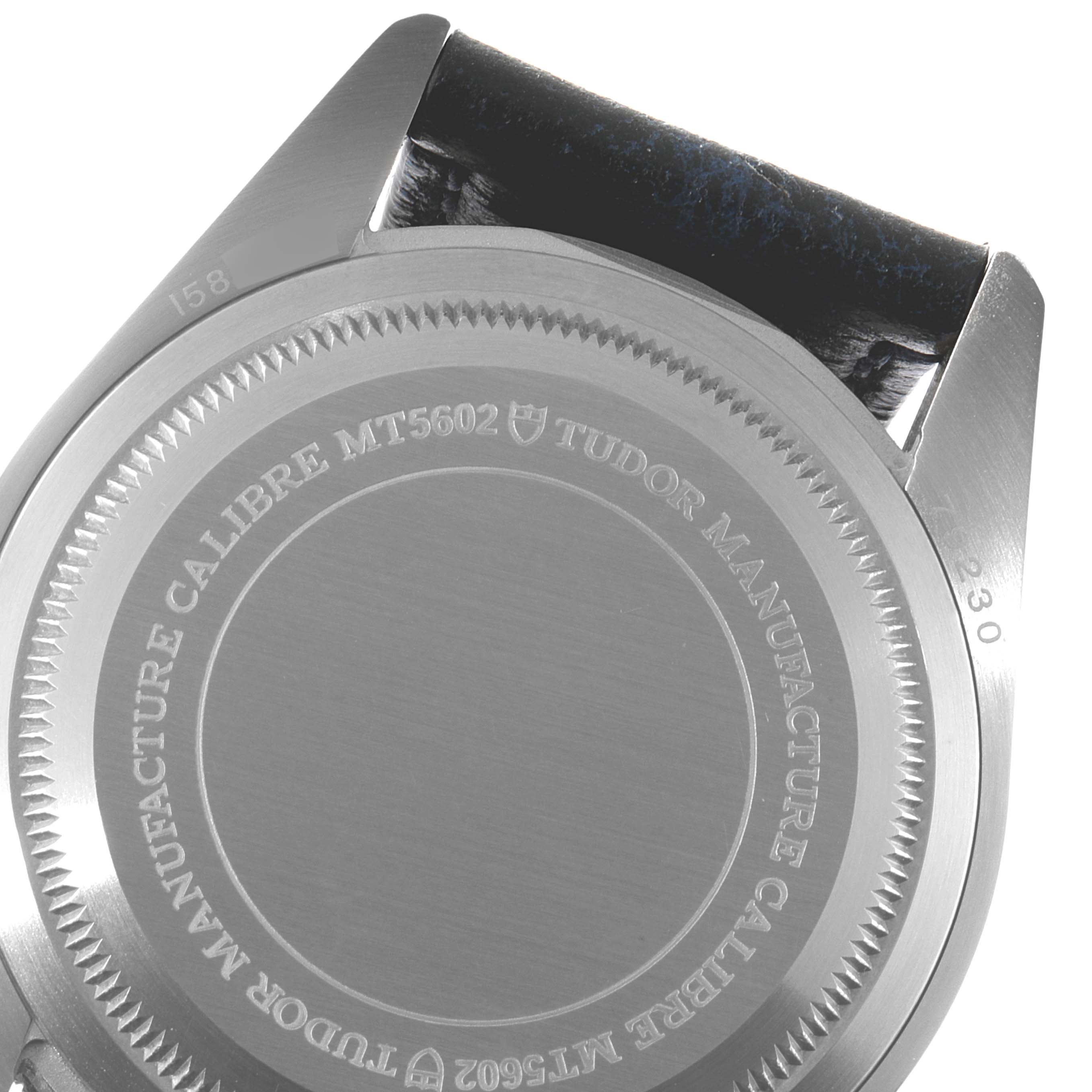The image shows the back casing and lugs of a Tudor Heritage Black Bay 79230B Men's Stainless Steel Black Dial 79230B Men's Stainless Steel Black Dial watch, highlighting the Calibre MT5602 mechanism.
