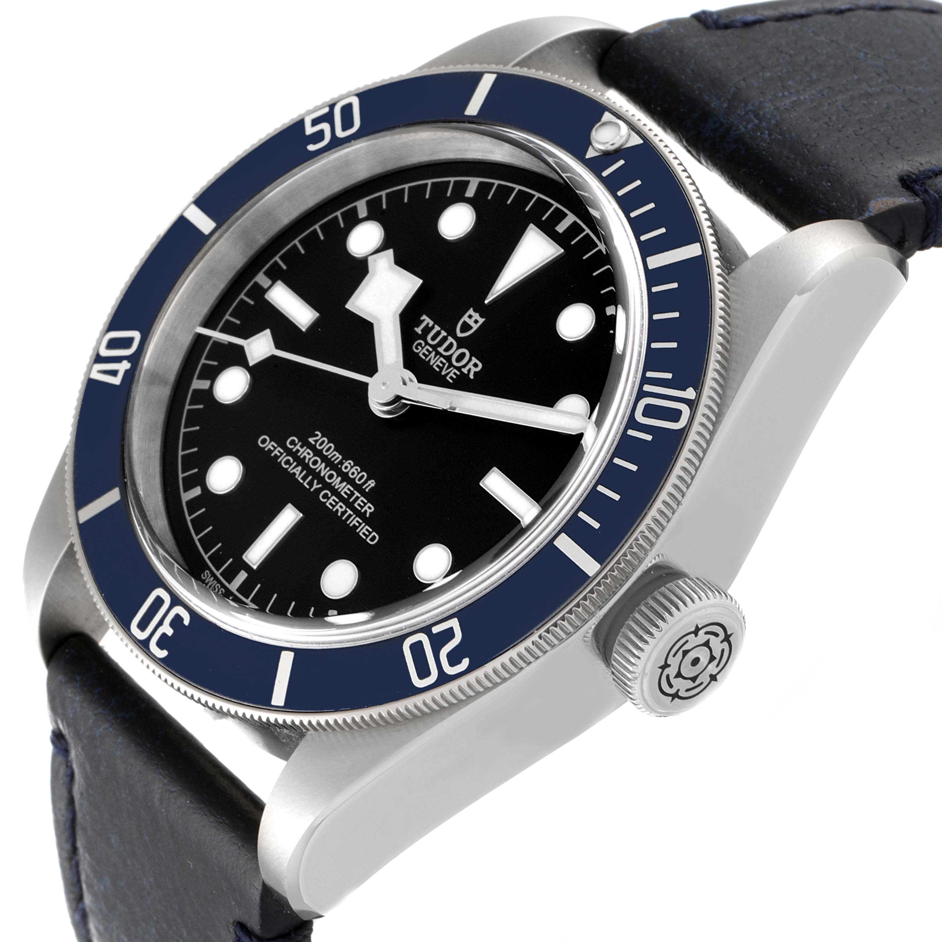 This image displays a close-up, angled view of the Tudor Heritage Black Bay 79230B Men's Stainless Steel Black Dial 79230B Men's Stainless Steel Black Dial watch, showing the face, bezel, and crown.