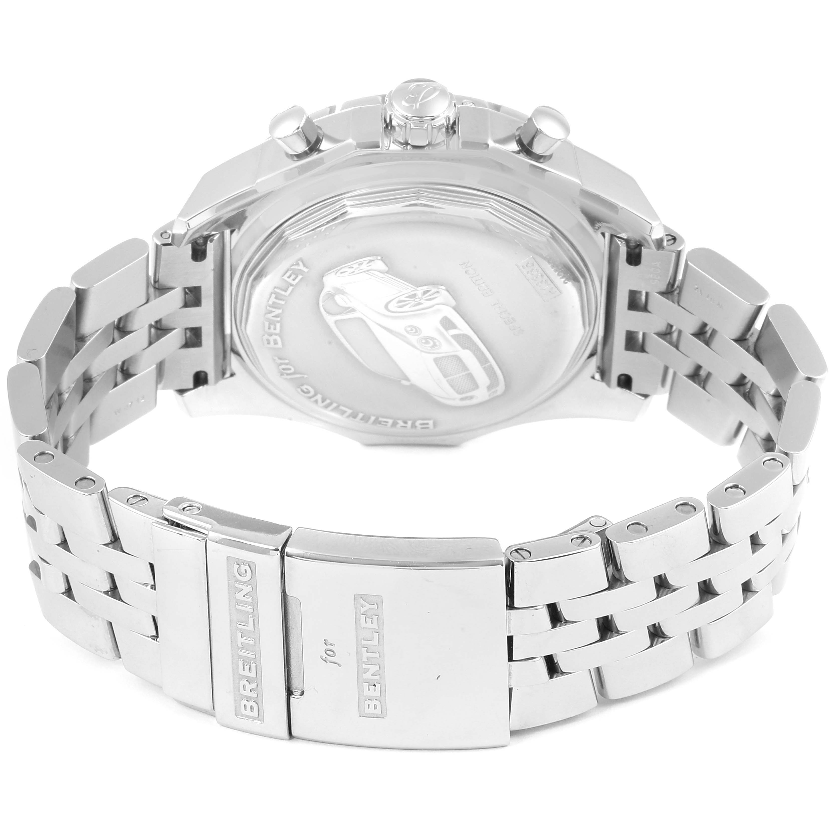 The image shows the back view of a Breitling for Bentley watch, highlighting the clasp, case back with engravings, and part of the bracelet.
