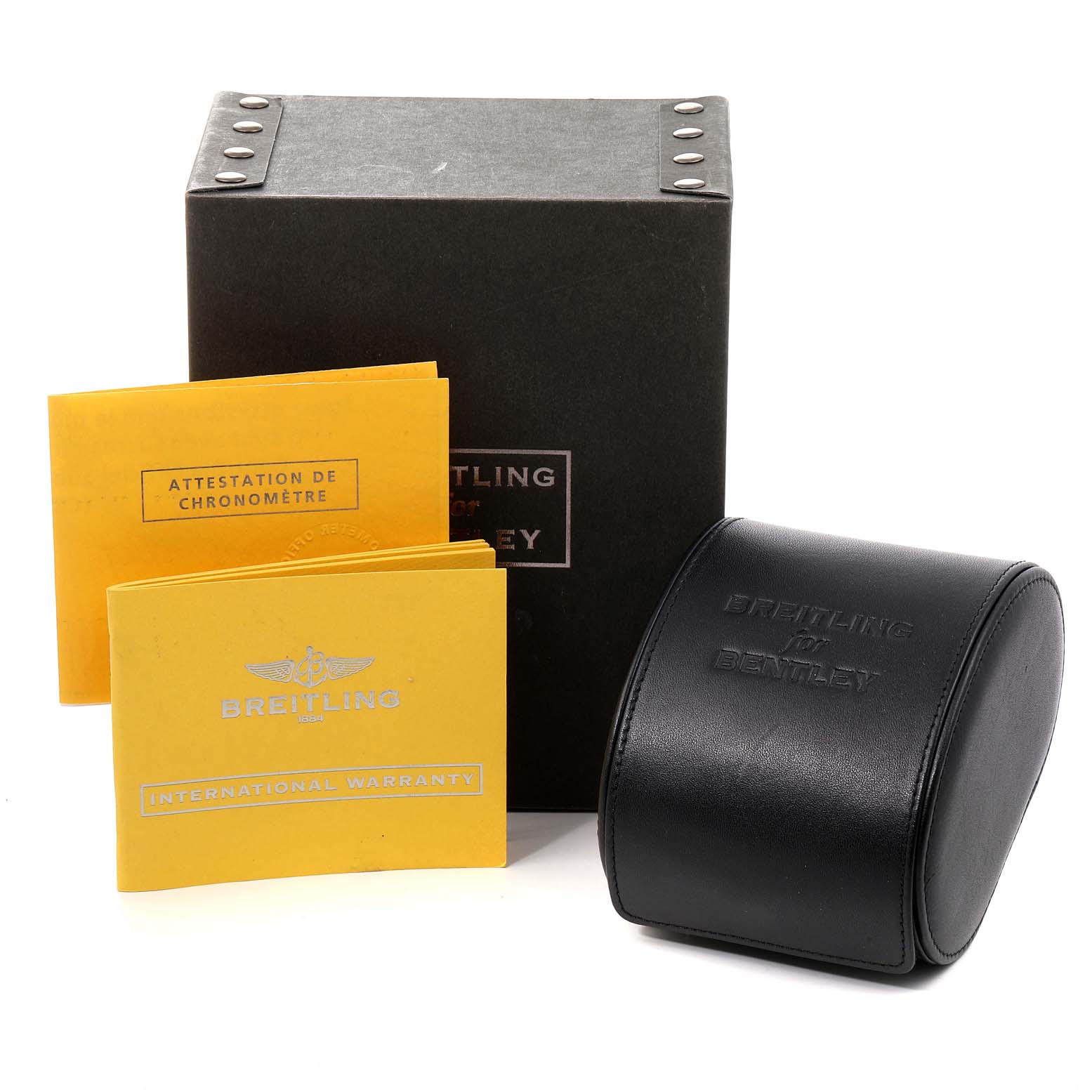 The image shows the packaging and documentation for a Breitling Bentley A13362 Men's Stainless Steel White Dial A13362 Men's Stainless Steel White Dial model watch, including a box, a leather case, and two booklets.