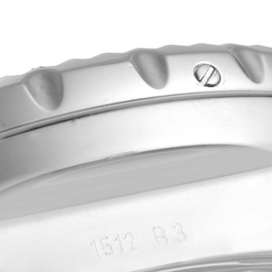 This close-up of the Breitling Bentley A13362 Men's Stainless Steel White Dial A13362 Men's Stainless Steel White Dial watch shows the bezel with markings and a screw.