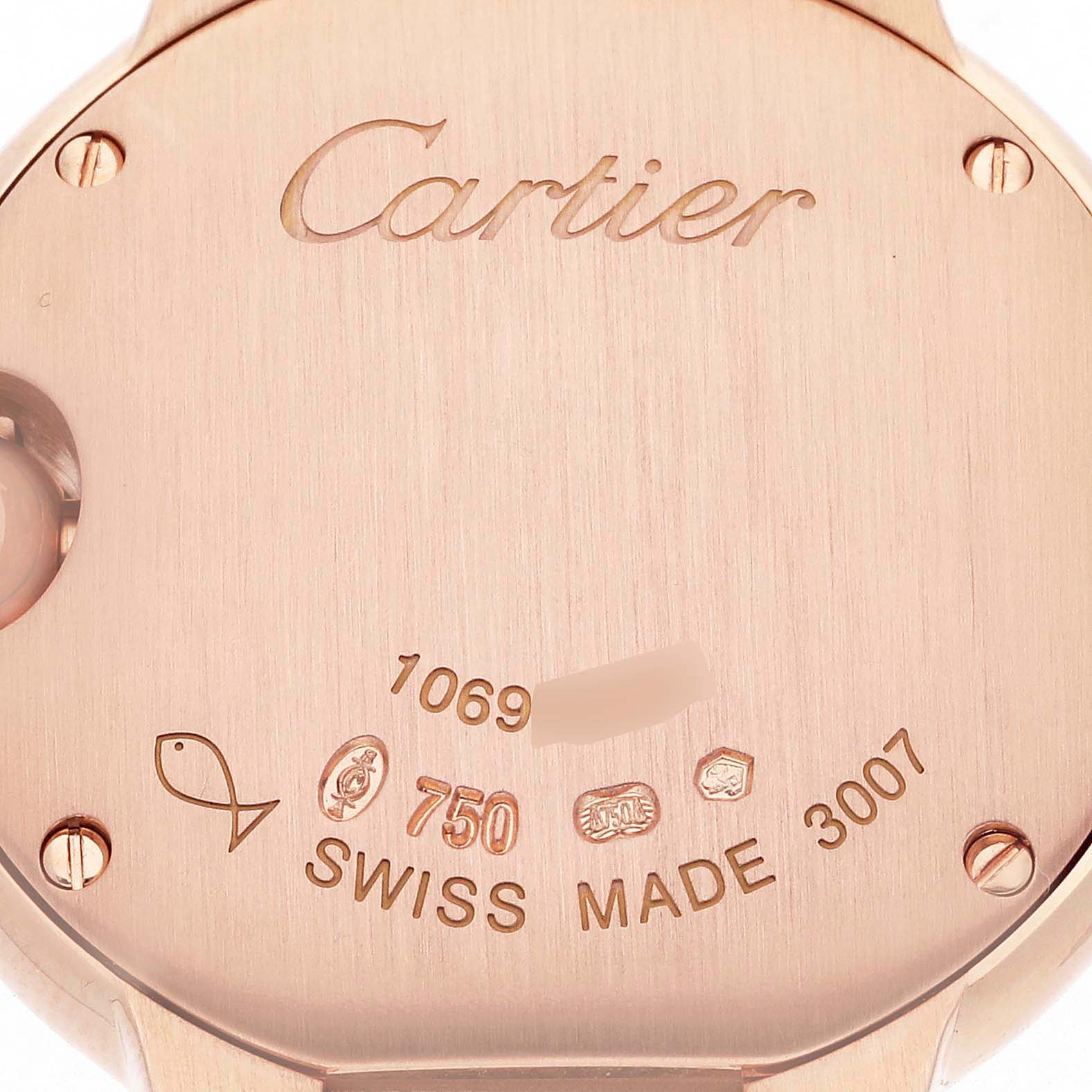 The image shows the back of a Cartier Ballon Bleu W69002Z2 Women's Rose Gold White Dial W69002Z2 Women's Rose Gold White Dial watch, highlighting engravings and screws.