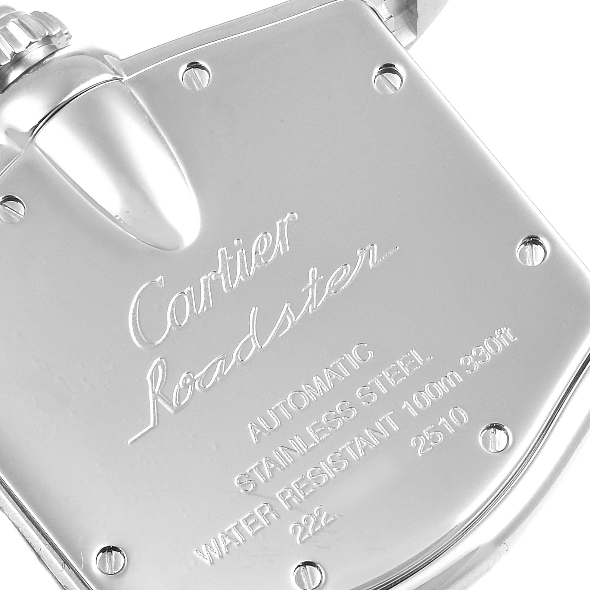 This image shows the back case of the Cartier Roadster W62000V3 Men's Stainless Steel Silver Dial W62000V3 Men's Stainless Steel Silver Dial watch, displaying its engravings and screw details.