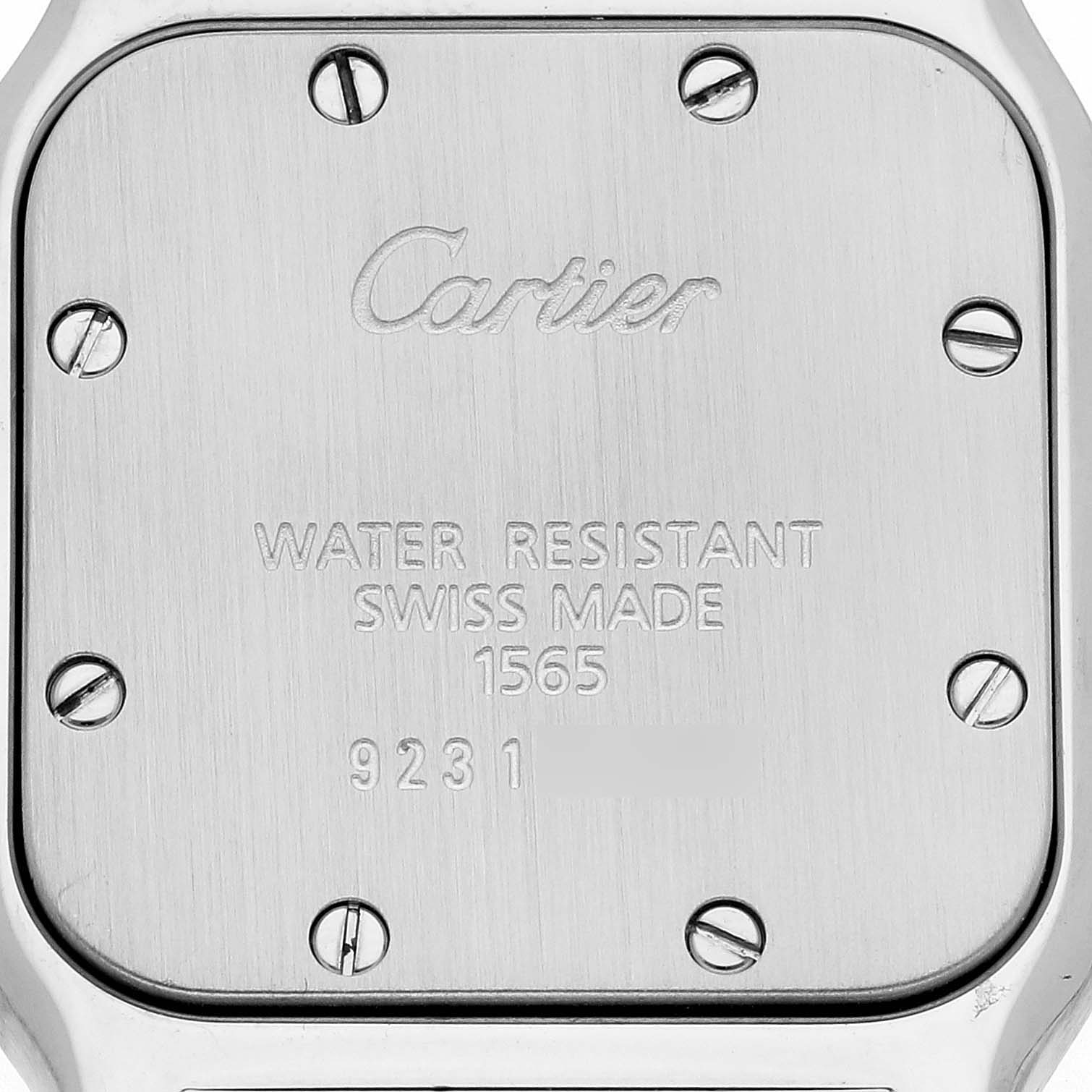 This image shows the back case of a Santos model by Cartier, featuring "WATER RESISTANT", "SWISS MADE", and serial numbers.