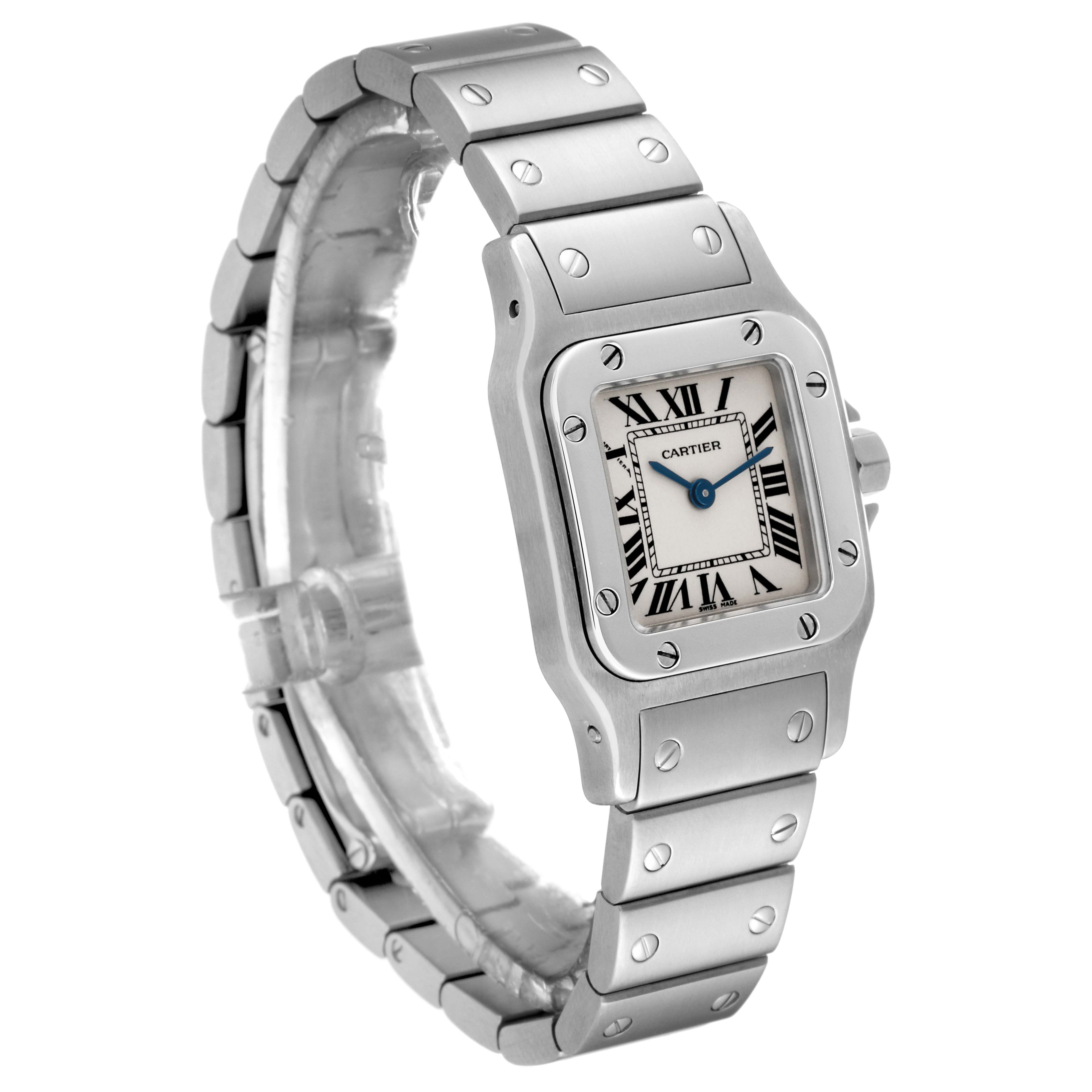 The image shows a side angle of the Cartier Santos W20056D6 Women
s Stainless Steel Silver Dial W20056D6 Women
s Stainless Steel Silver Dial watch, highlighting its bracelet, bezel, and dial.