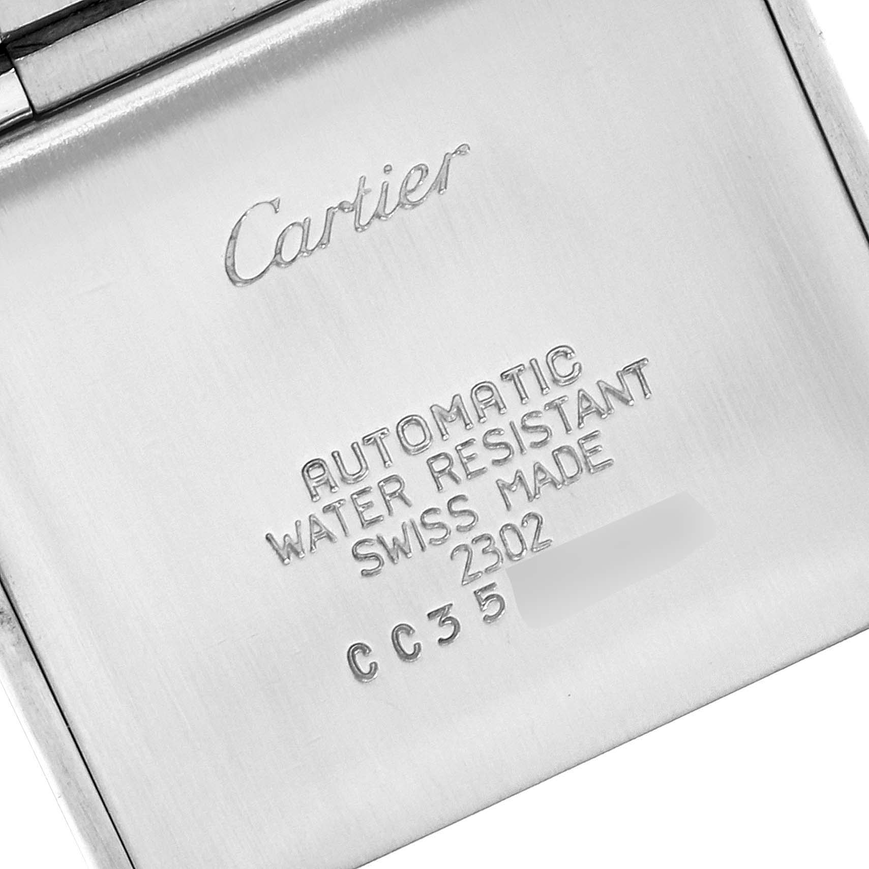 This is a close-up of the back case of a Cartier Tank Francaise W51002Q3 Men's Stainless Steel Silver Dial W51002Q3 Men's Stainless Steel Silver Dial watch, showing its branding and specifications.