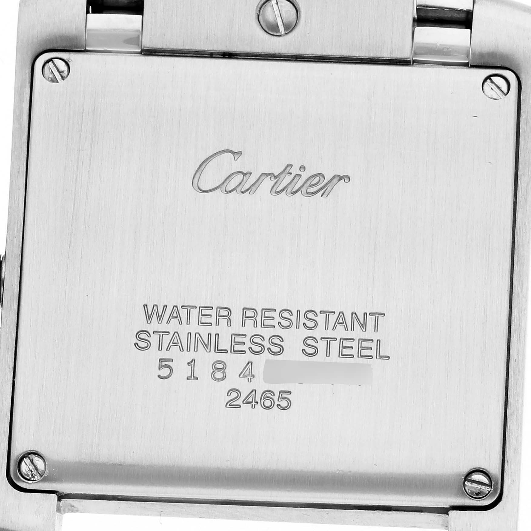 The image shows the back of the Cartier Tank Française watch, highlighting its stainless steel case and brand engraving.