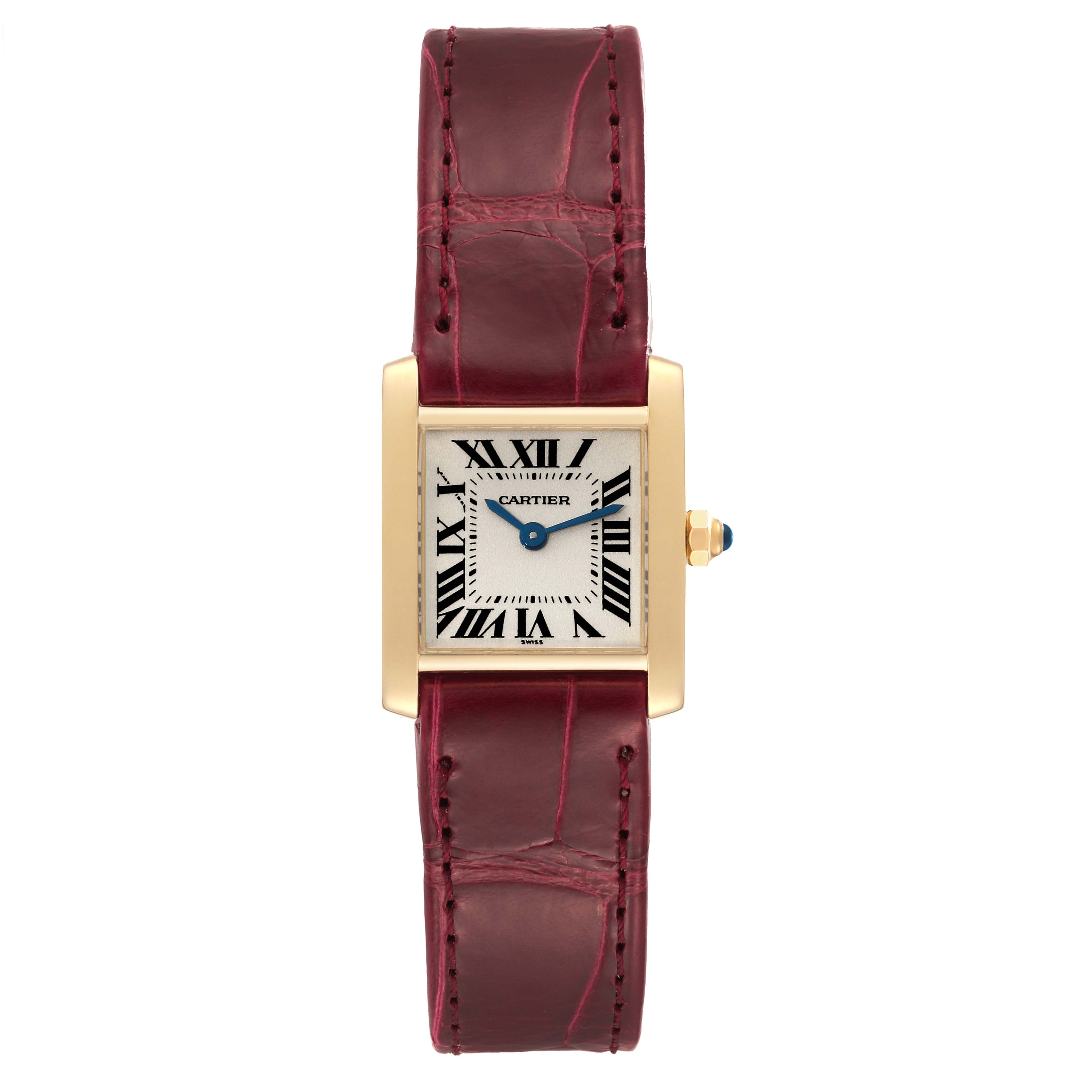 This image shows a front view of a Cartier Tank Francaise W5000256 Women's Yellow Gold Silver Dial W5000256 Women's Yellow Gold Silver Dial watch with a red leather strap.