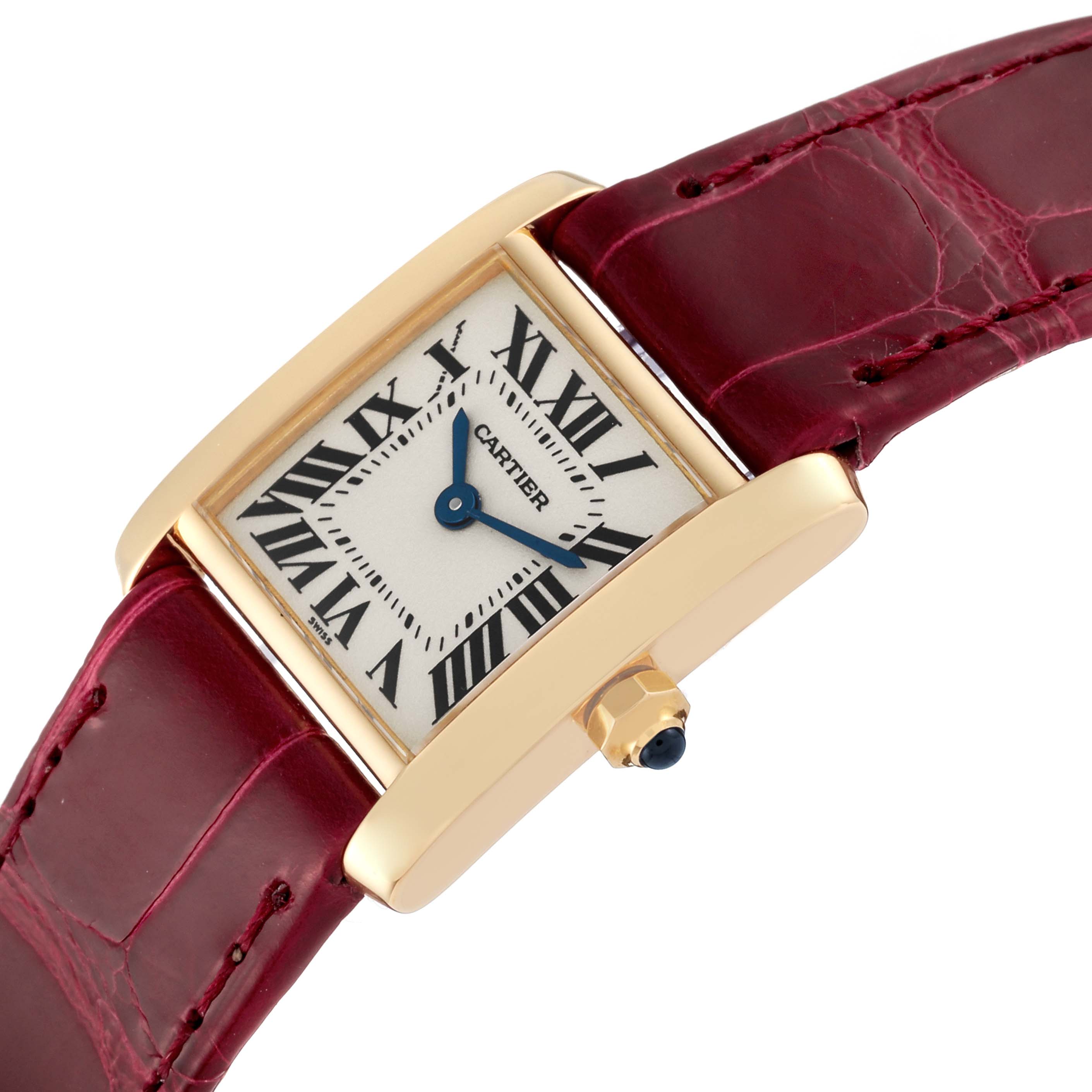 The image shows a close-up of the Cartier Tank Francaise W5000256 Women's Yellow Gold Silver Dial W5000256 Women's Yellow Gold Silver Dial watch, highlighting its rectangular case, crown, and leather strap.