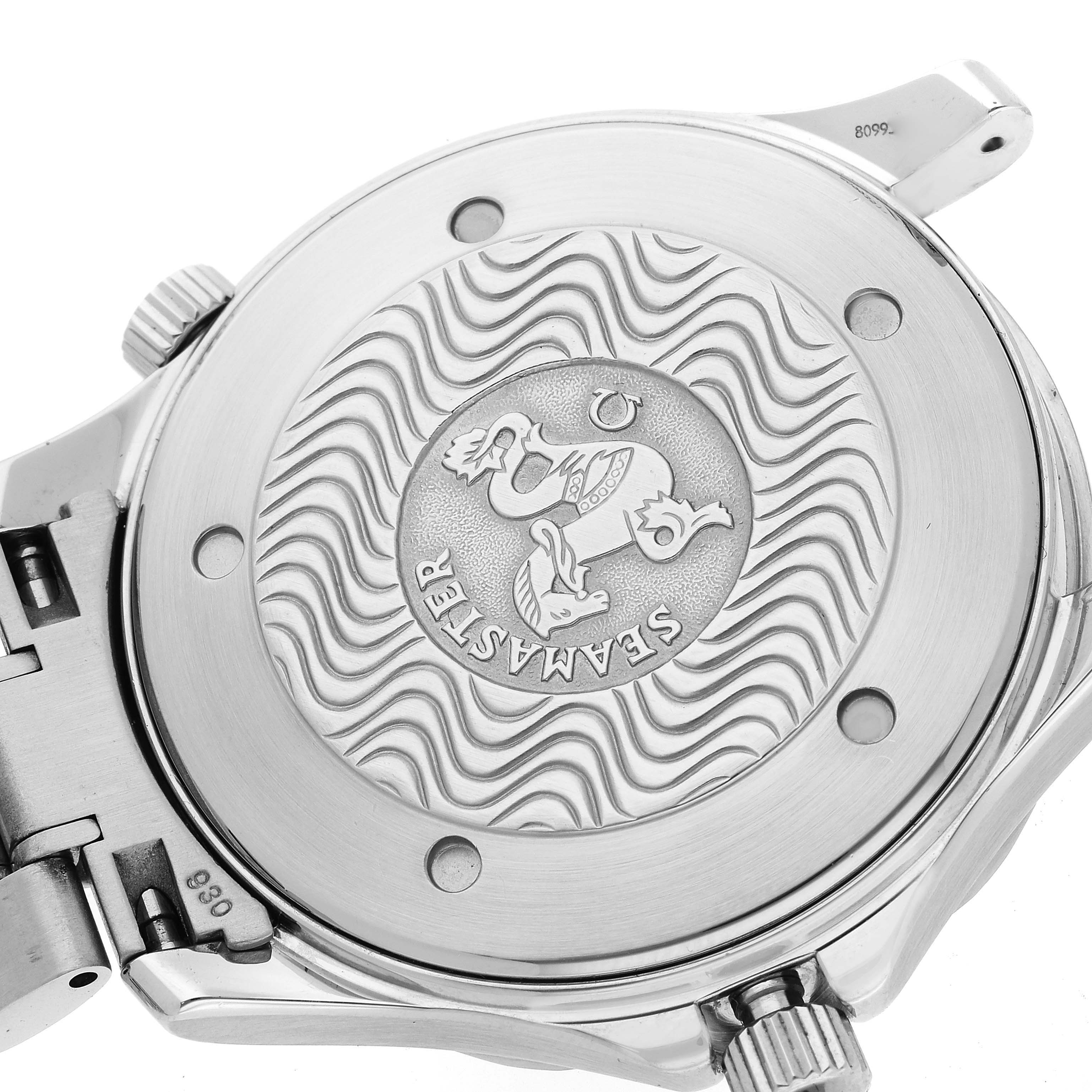 This image shows the caseback of an Omega Seamaster 2255.80.00 Men
s Stainless Steel Blue Dial 2255.80.00 Men
s Stainless Steel Blue Dial model, highlighting the engraved emblem and wave pattern.