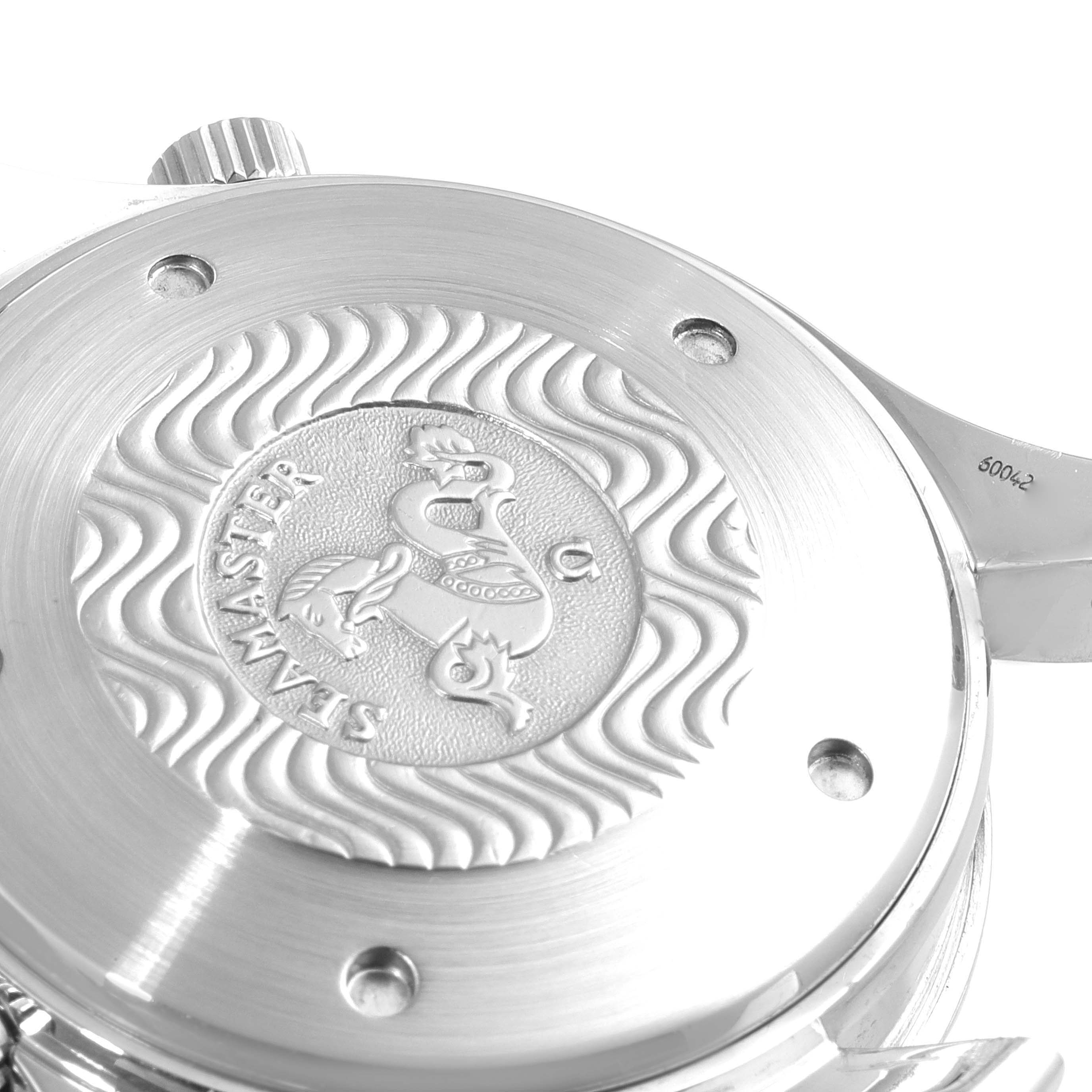 This image shows the case back of an Omega Seamaster 2599.80.00 Men's Stainless Steel Blue Dial 2599.80.00 Men's Stainless Steel Blue Dial watch at a close-up angle, highlighting its engraved details.