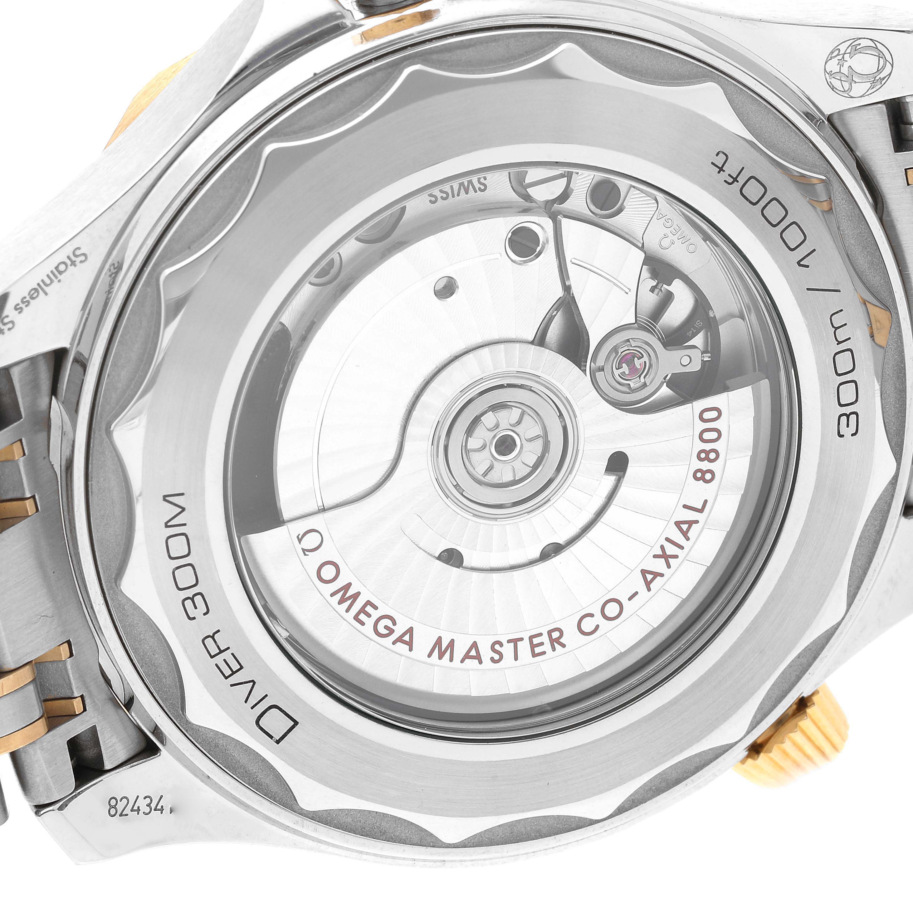 This image shows the case back of an Omega Seamaster 210.20.42.20.03.001 Men's Steel and Gold (two tone) Blue Dial 210.20.42.20.03.001 Men's Steel and Gold (two tone) Blue Dial Diver 300M, highlighting the Omega Master Co-Axial 8800 movement.