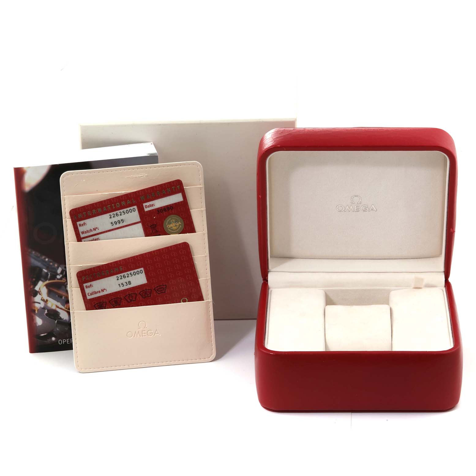 The image shows a red Omega Seamaster 2262.50.00 Men
s Stainless Steel Black Dial 2262.50.00 Men
s Stainless Steel Black Dial watch box, warranty cards in a holder, and an instruction manual, all at a straight-on angle.