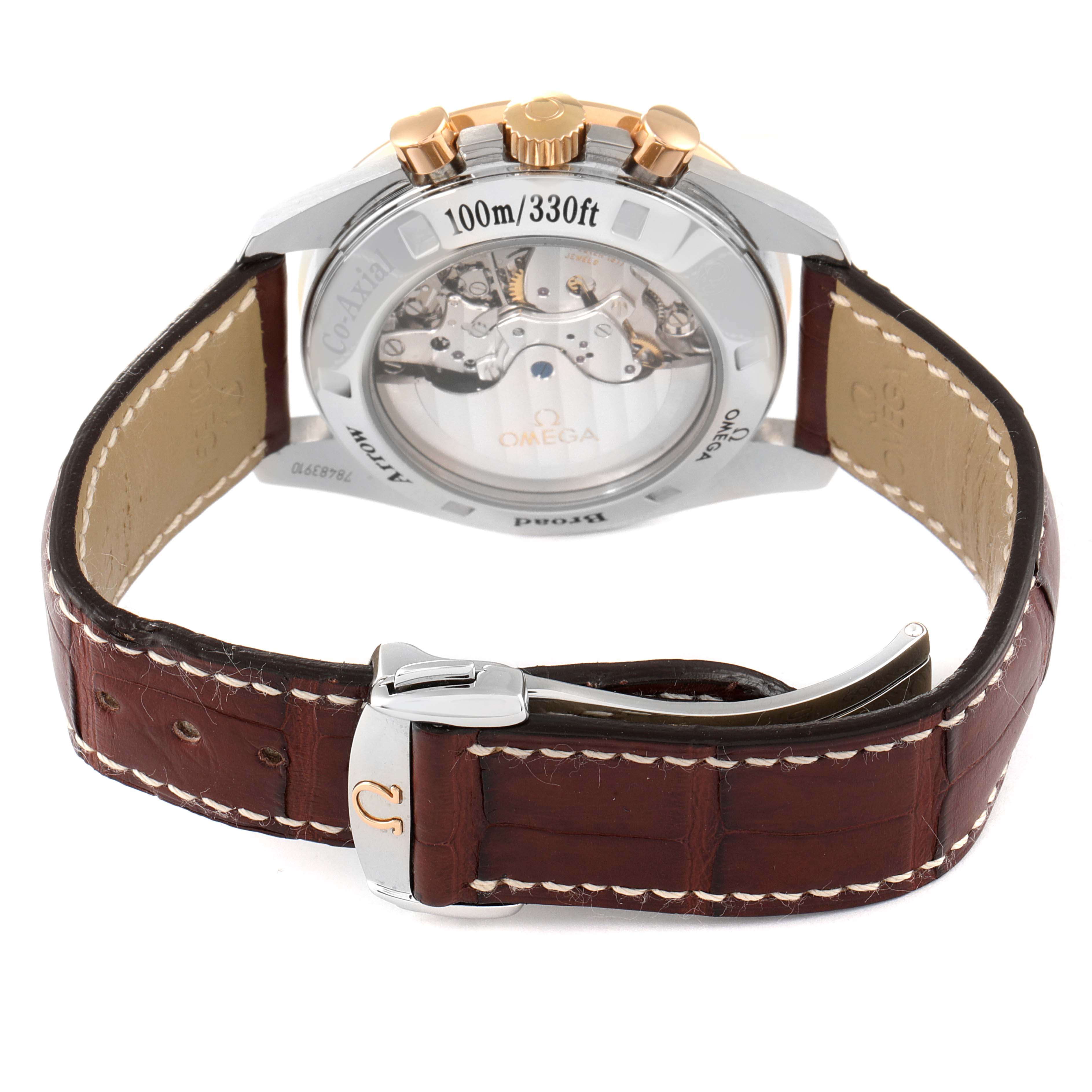 The image shows the back view of an Omega Speedmaster 321.93.42.50.13.001 Men's Steel and Gold (two tone) Brown Dial 321.93.42.50.13.001 Men's Steel and Gold (two tone) Brown Dial watch, highlighting its transparent case back and brown leather strap.