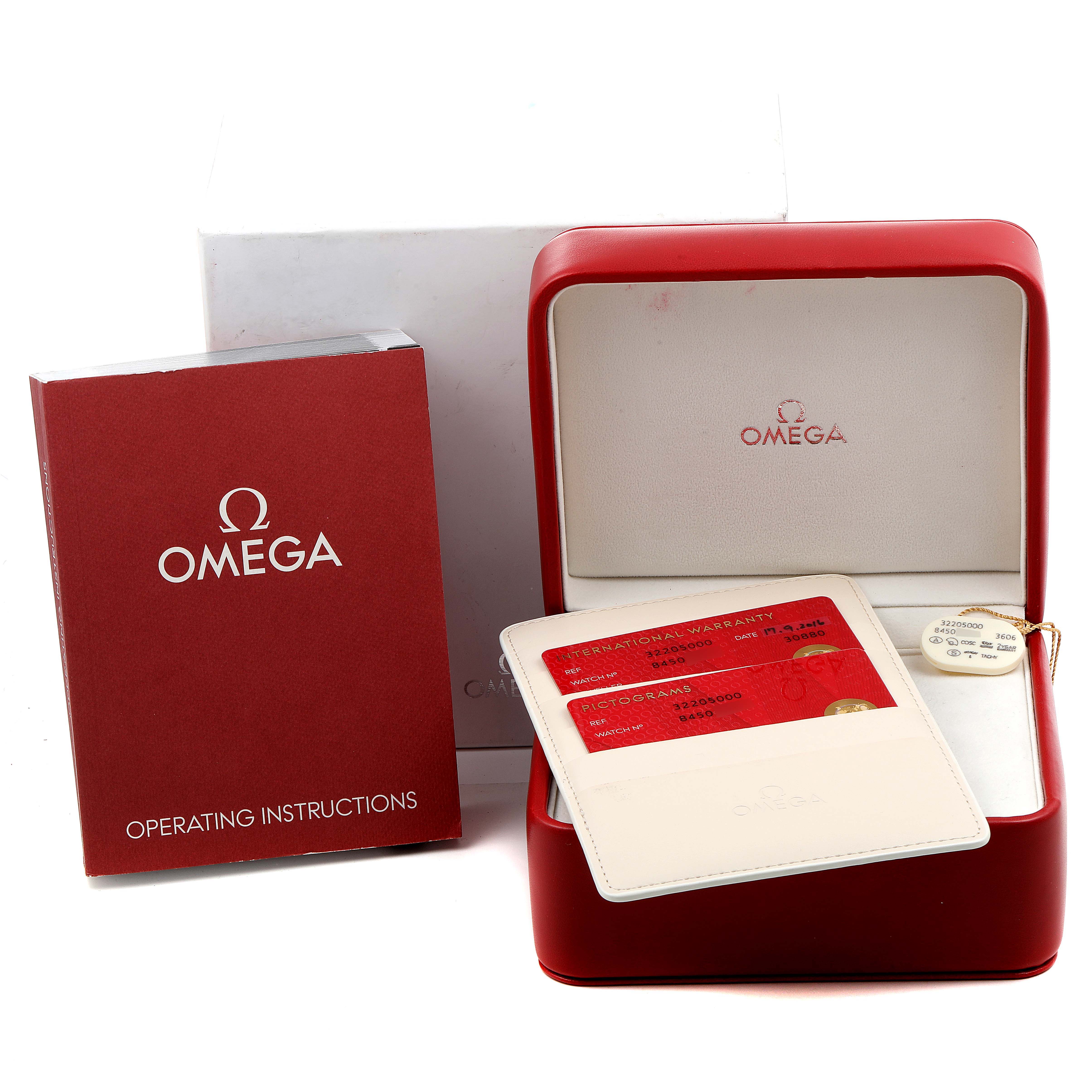 The image shows Omega Speedmaster 3220.50.00 Men
s Stainless Steel Black Dial 3220.50.00 Men
s Stainless Steel Black Dial items including an operating instructions booklet, warranty cards, a case, and a box.