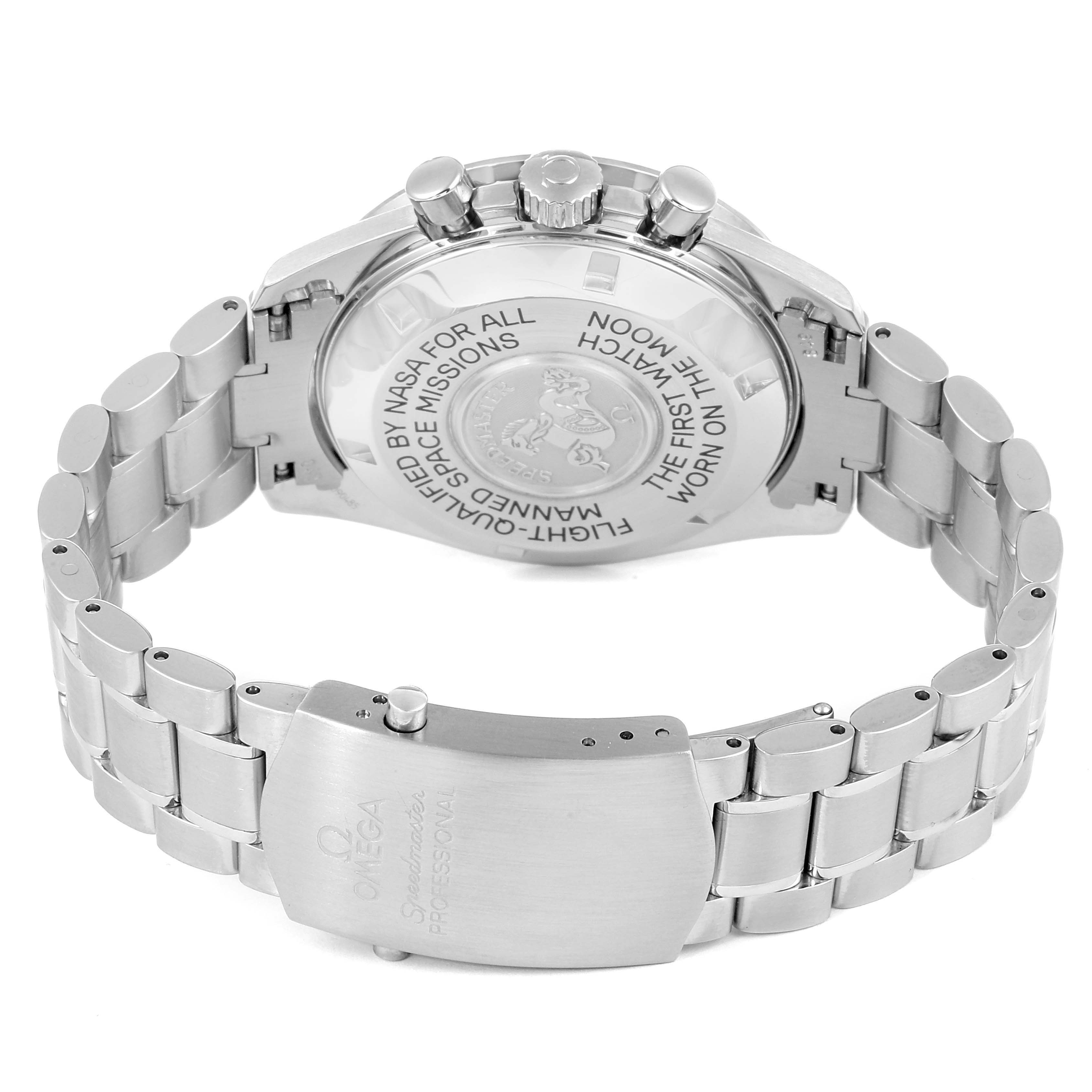 The image shows the back of the Omega Speedmaster 3575.20.00 Men's Stainless Steel White Dial 3575.20.00 Men's Stainless Steel White Dial watch, focusing on its metal bracelet and engraved case back.