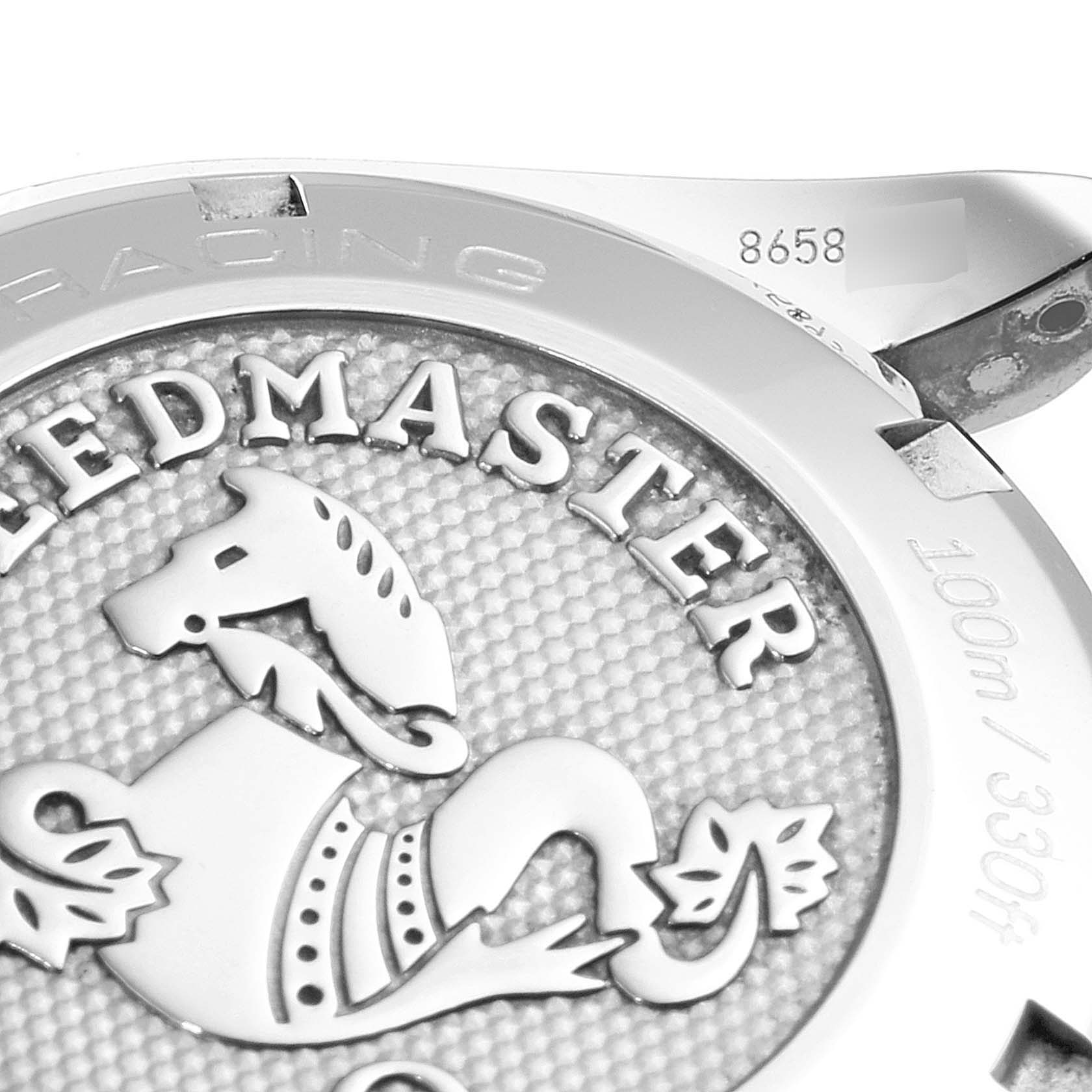 This close-up photo shows the back case of an Omega Speedmaster 326.30.40.50.02.001 Men
s Stainless Steel Silver Dial 326.30.40.50.02.001 Men
s Stainless Steel Silver Dial watch, highlighting the engraved logo and text details.