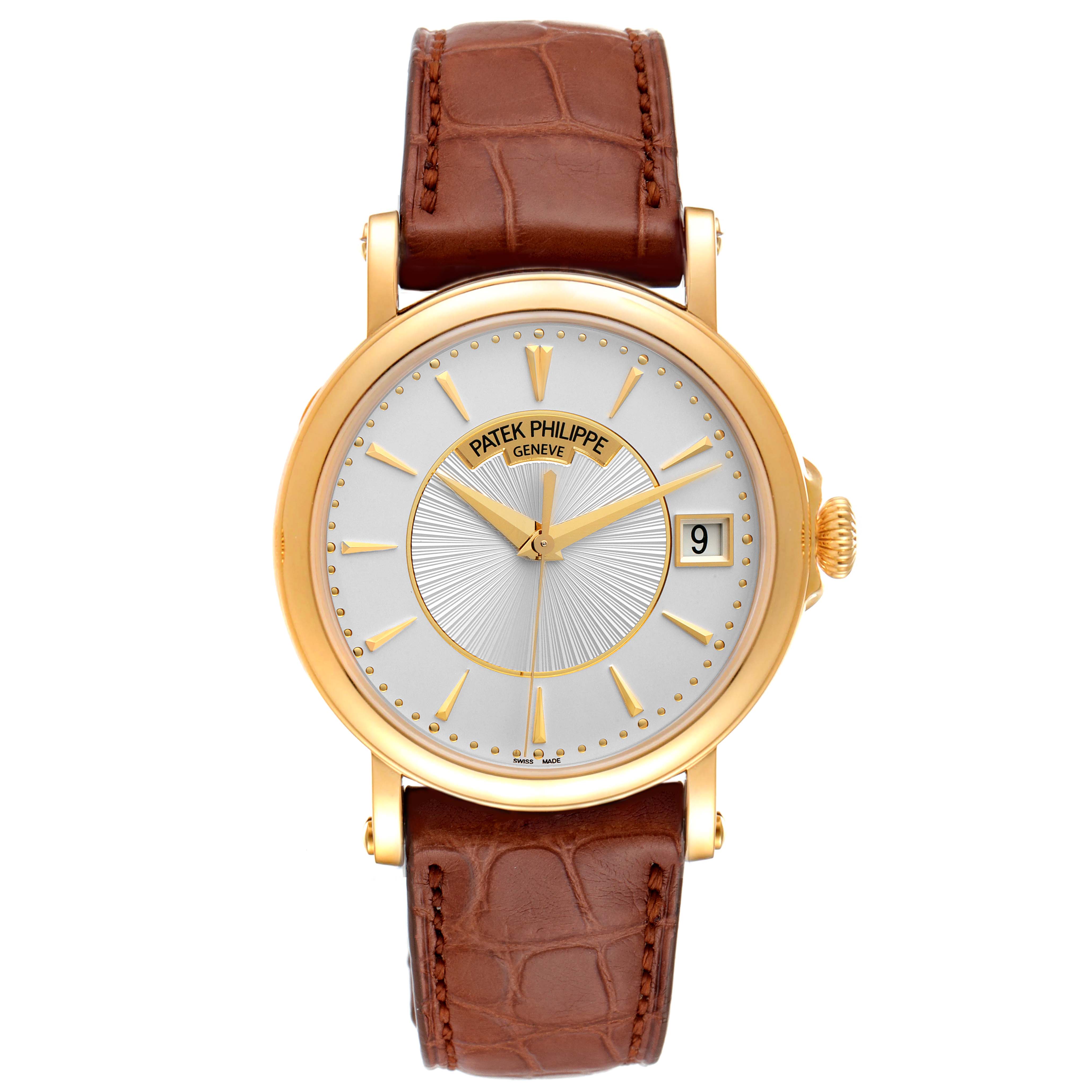 The image shows a frontal view of the Patek Philippe Calatrava 5153J Men's Yellow Gold Silver Dial 5153J Men's Yellow Gold Silver Dial watch with a brown leather strap and a gold case.