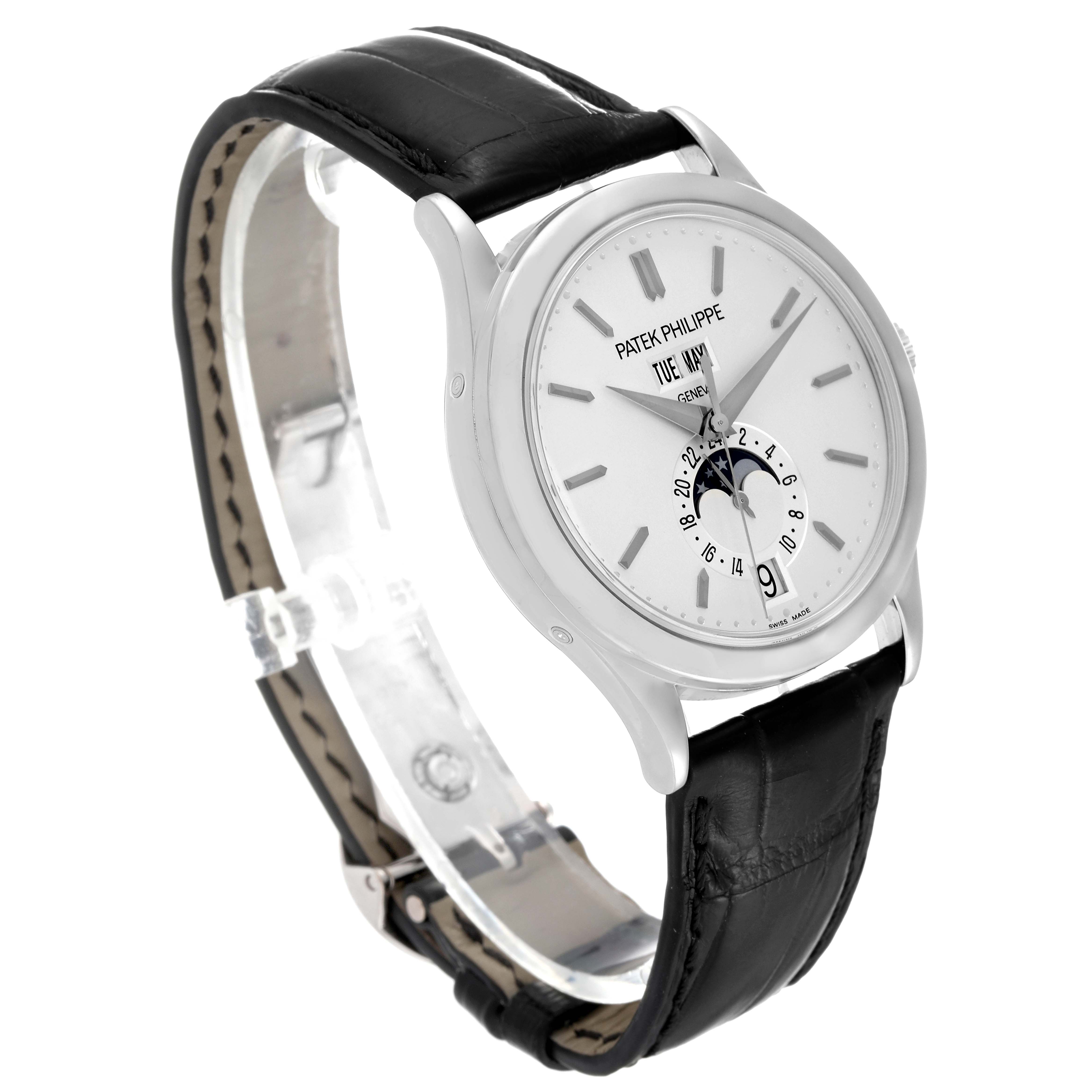 This image shows a side angle of a Patek Philippe Complications 5396G-011 Men's White Gold Silver Dial 5396G-011 Men's White Gold Silver Dial model watch, highlighting its face and leather strap.