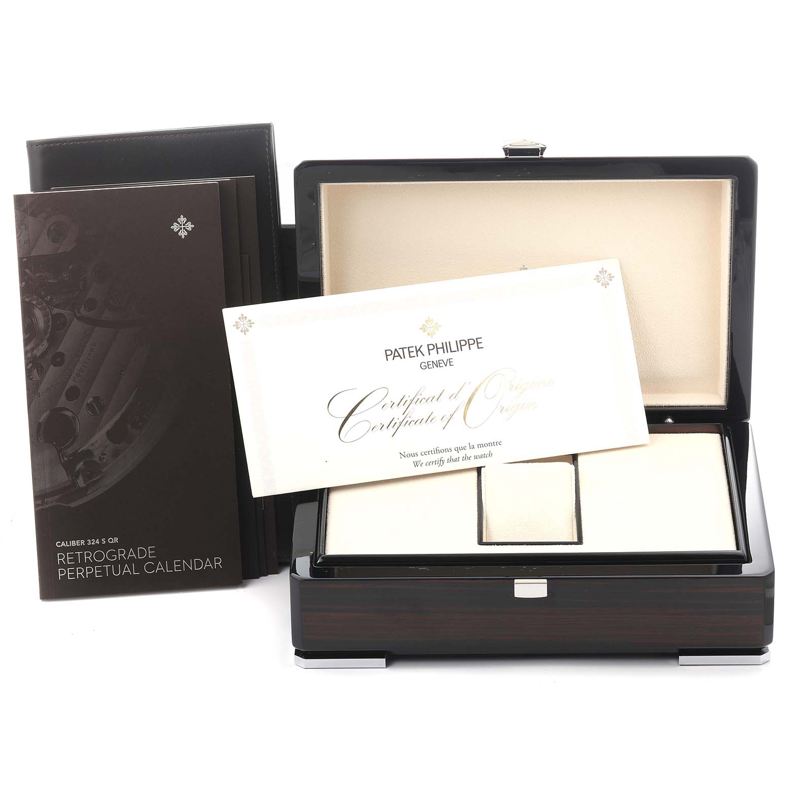 The image shows the Patek Philippe Complications 5496R-001 Men
s Rose Gold Silver Dial 5496R-001 Men
s Rose Gold Silver Dial watch box, certificate of origin, and manual at a frontal angle.