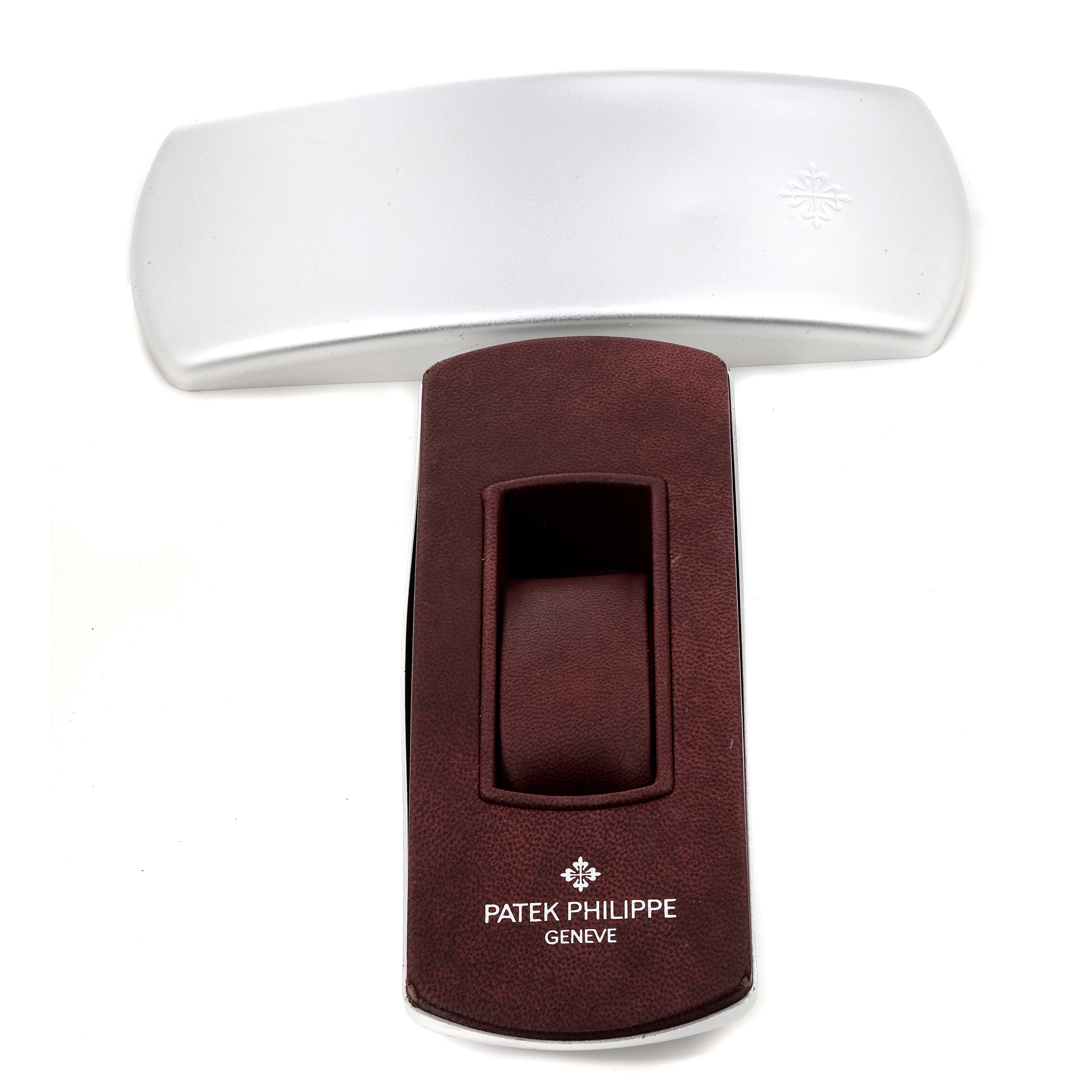 The image shows a Patek Philippe Twenty-4 4908/11R Women's Rose Gold Brown Dial 4908/11R Women's Rose Gold Brown Dial watch display stand from a top-down angle.