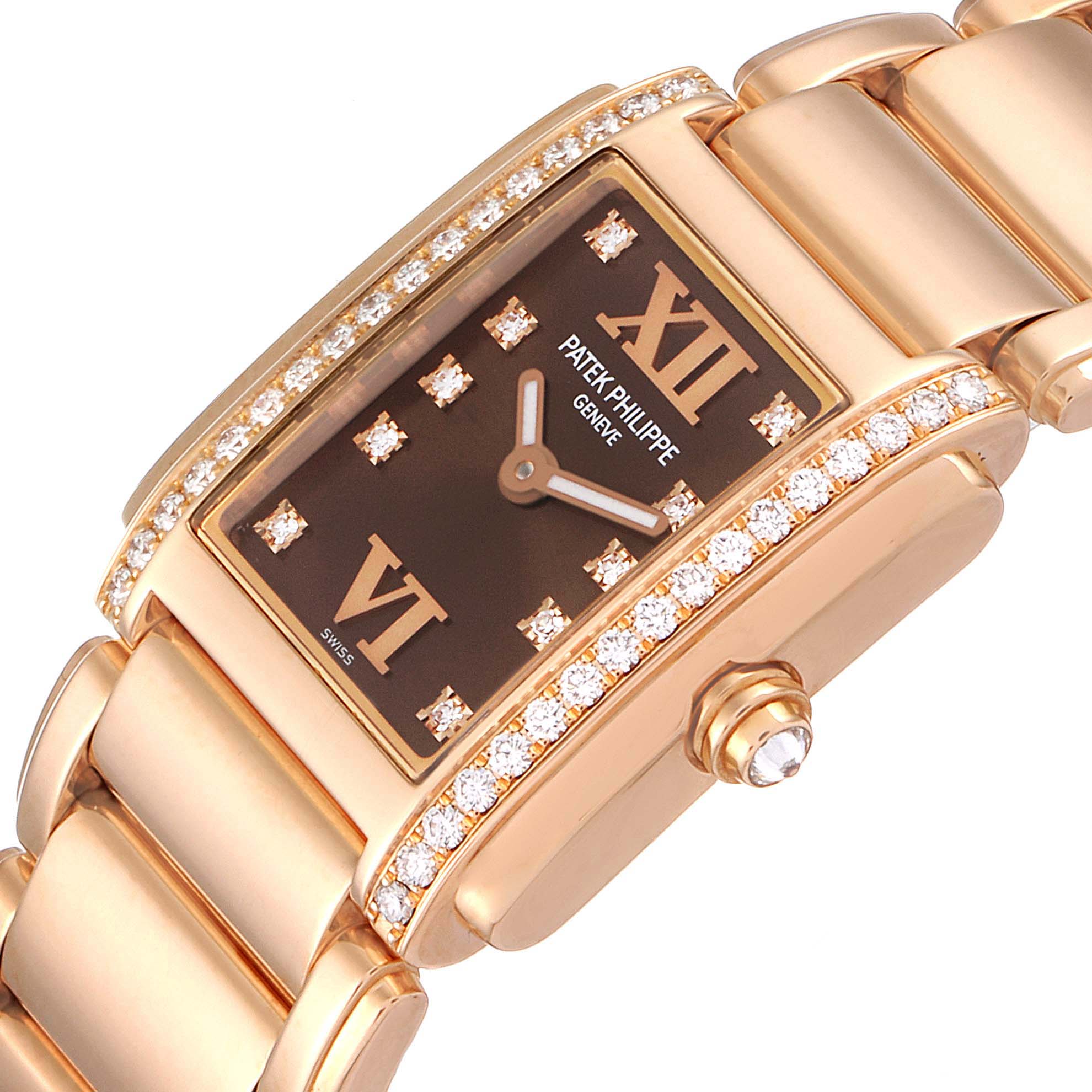 This image shows a close-up of a Patek Philippe Twenty-4 4908/11R Women's Rose Gold Brown Dial 4908/11R Women's Rose Gold Brown Dial watch's face, bezel, crown, and bracelet at an angle.