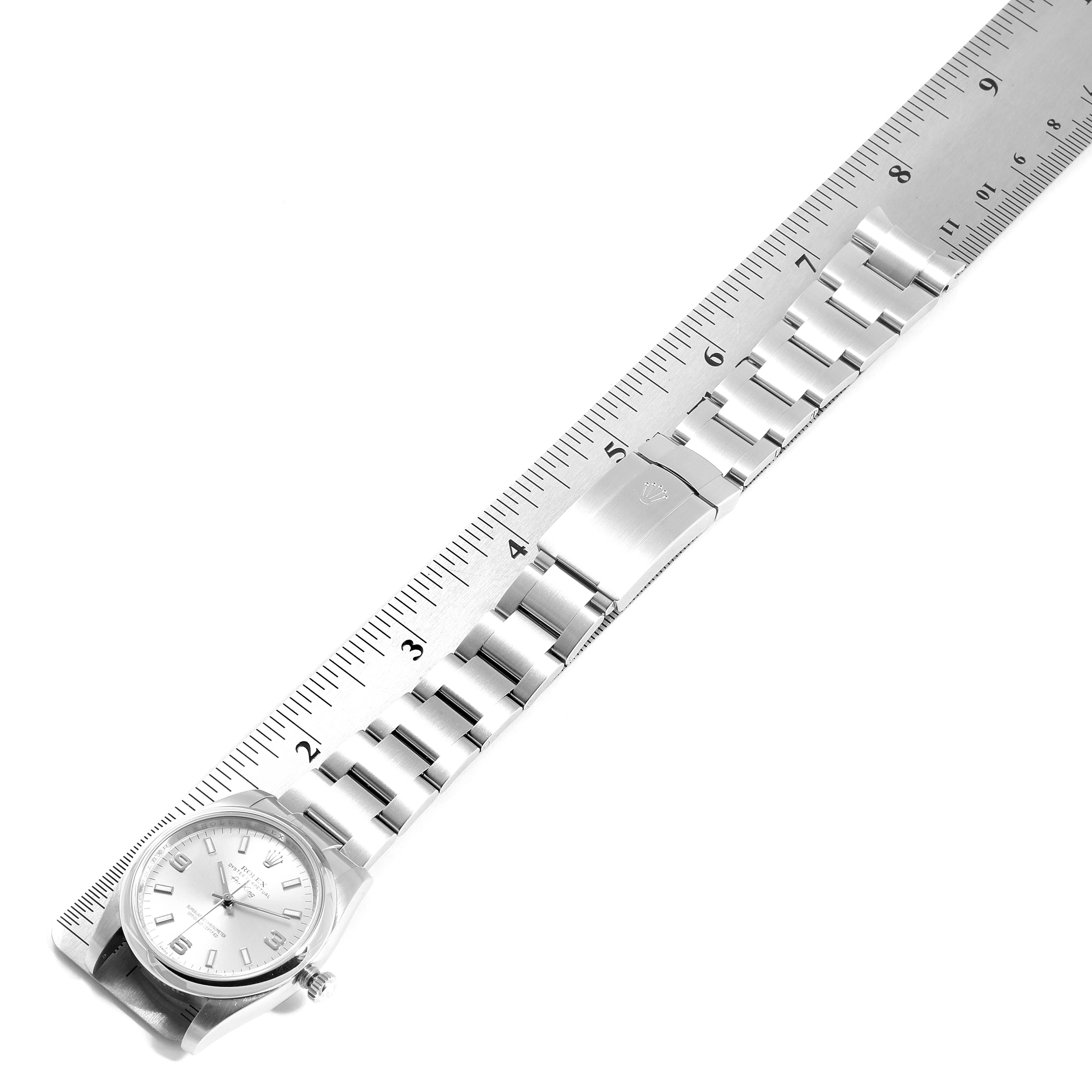 The image shows a flat lay view of the Rolex Air-King 114200 Men's Stainless Steel Silver Dial 114200 Men's Stainless Steel Silver Dial watch, highlighting its bracelet, clasp, and a small portion of the dial.