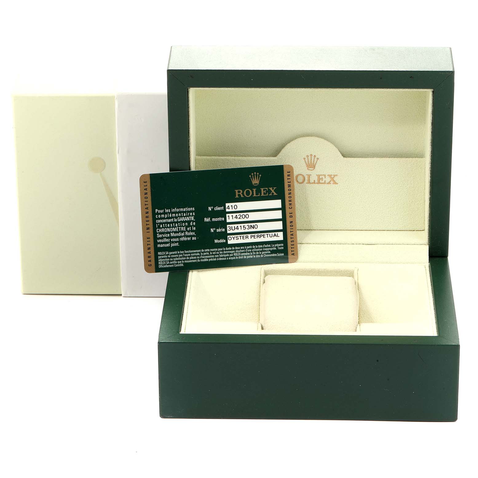 The image shows an open Rolex watch box for the Air-King model, including a warranty card and the internal cushion.